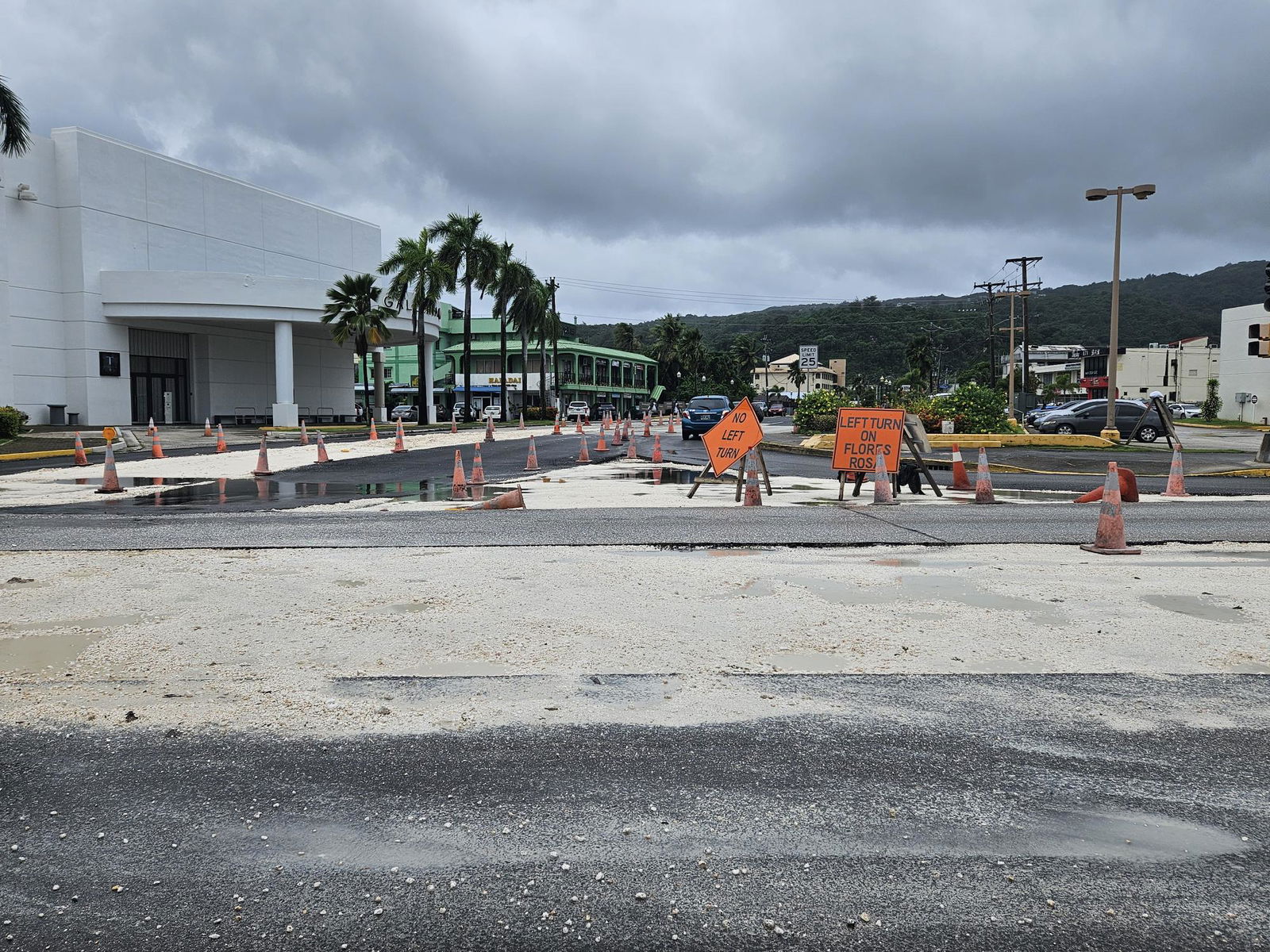 Road construction at a Garapan intersection stopped on Monday due to rainy weather.