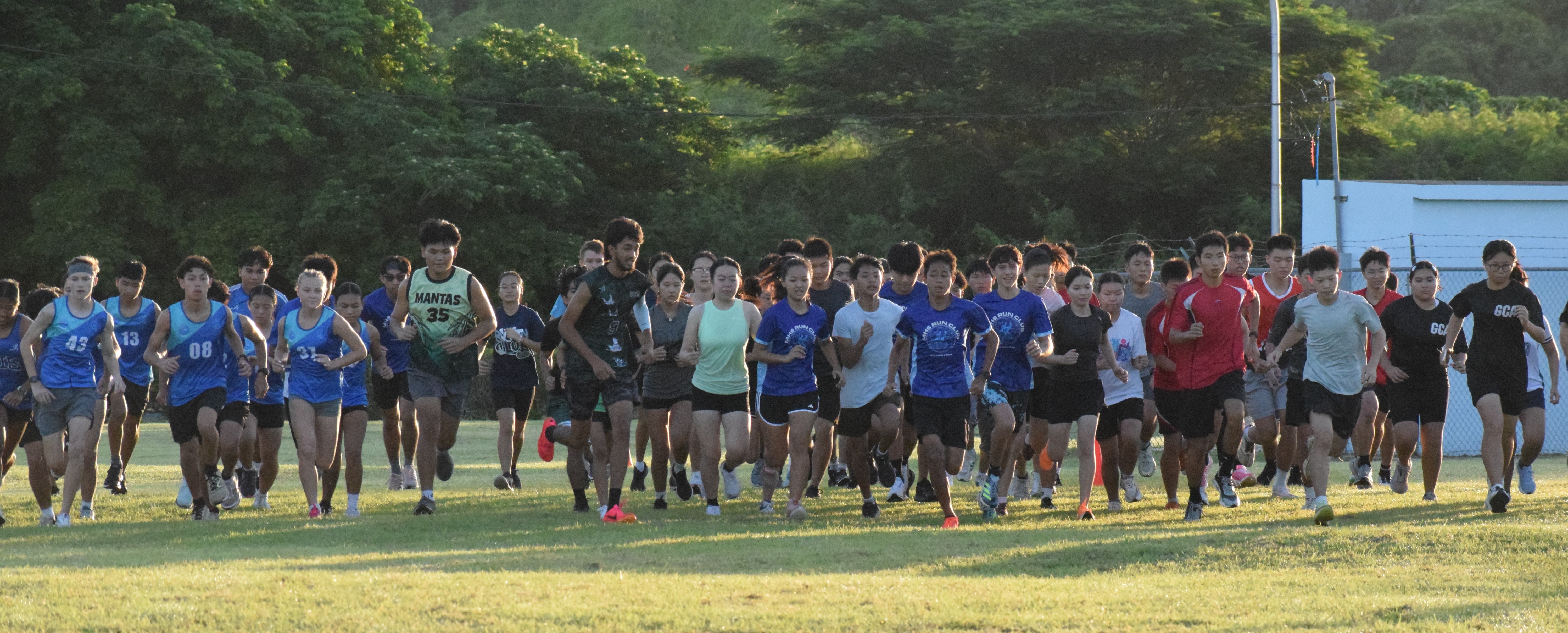 High school students take off during the Public School System Cross Country event at airport field on Saturday.