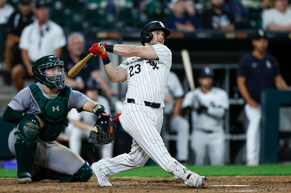 Chicago White Sox outfielder Andrew Benintendi (23) hits a walk-off home run against the Oakland Athletics during the ninth inning at Guaranteed Rate Field in Chicago, Illinois, Sept. 14, 2024.