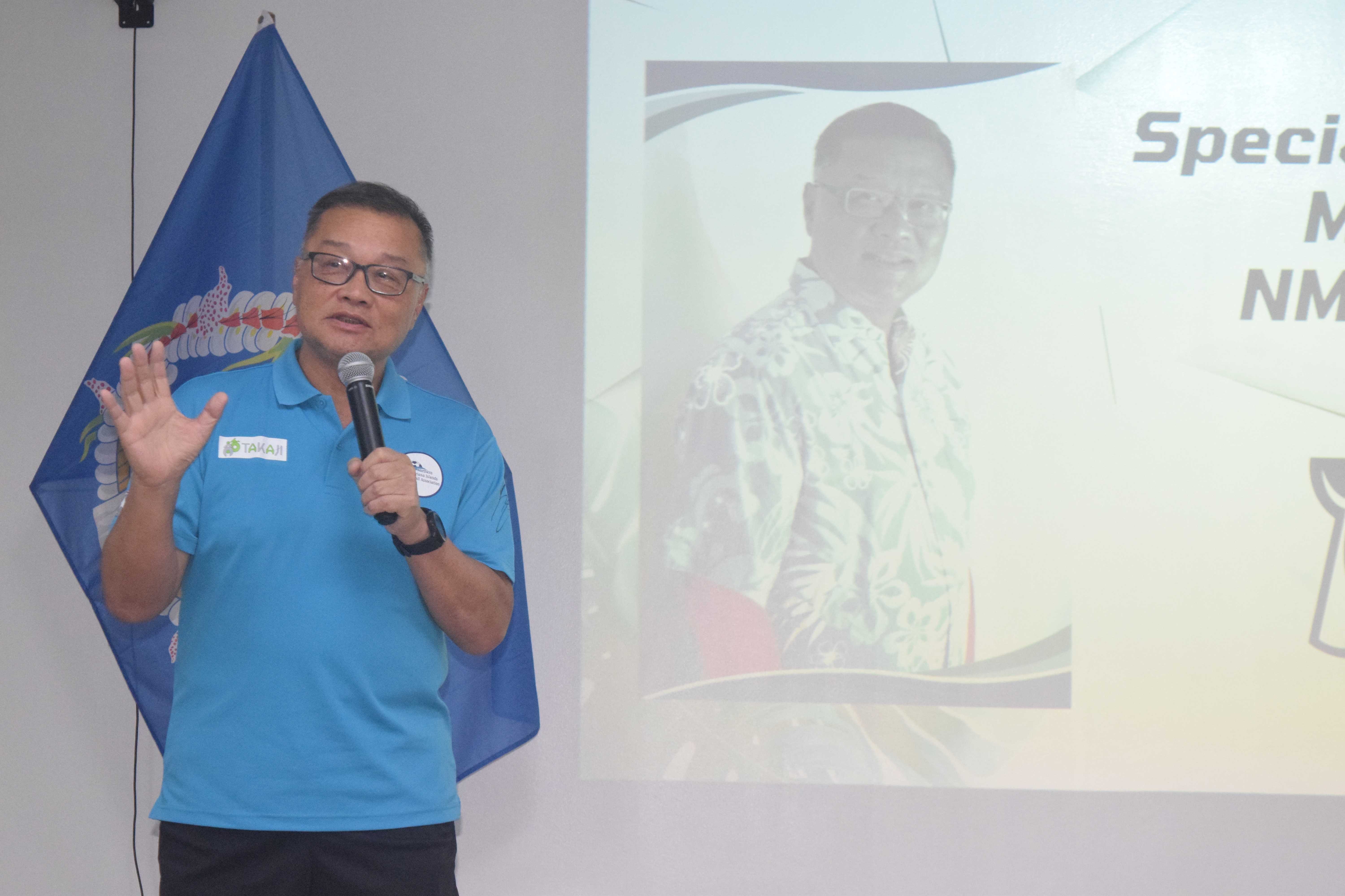 NMI Football Association President Jerry Tan delivers his remarks.