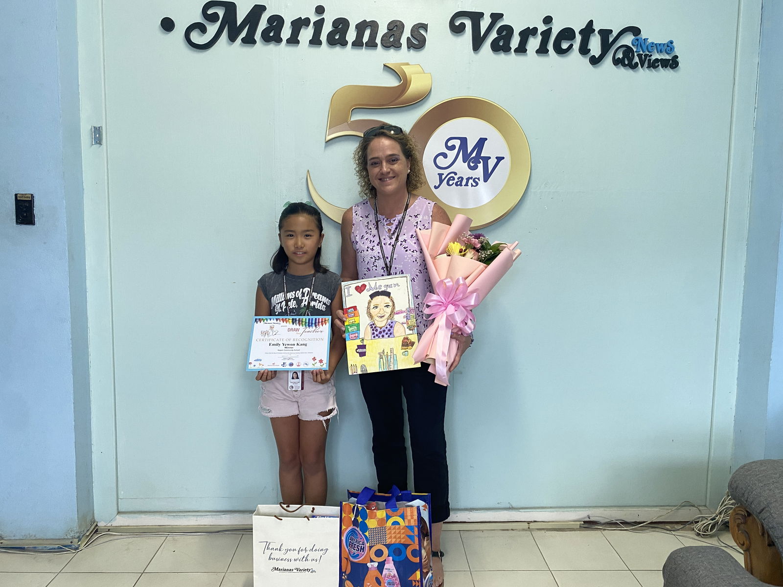 Saipan Community School's Emily Kang, left, and Megan Dame. 