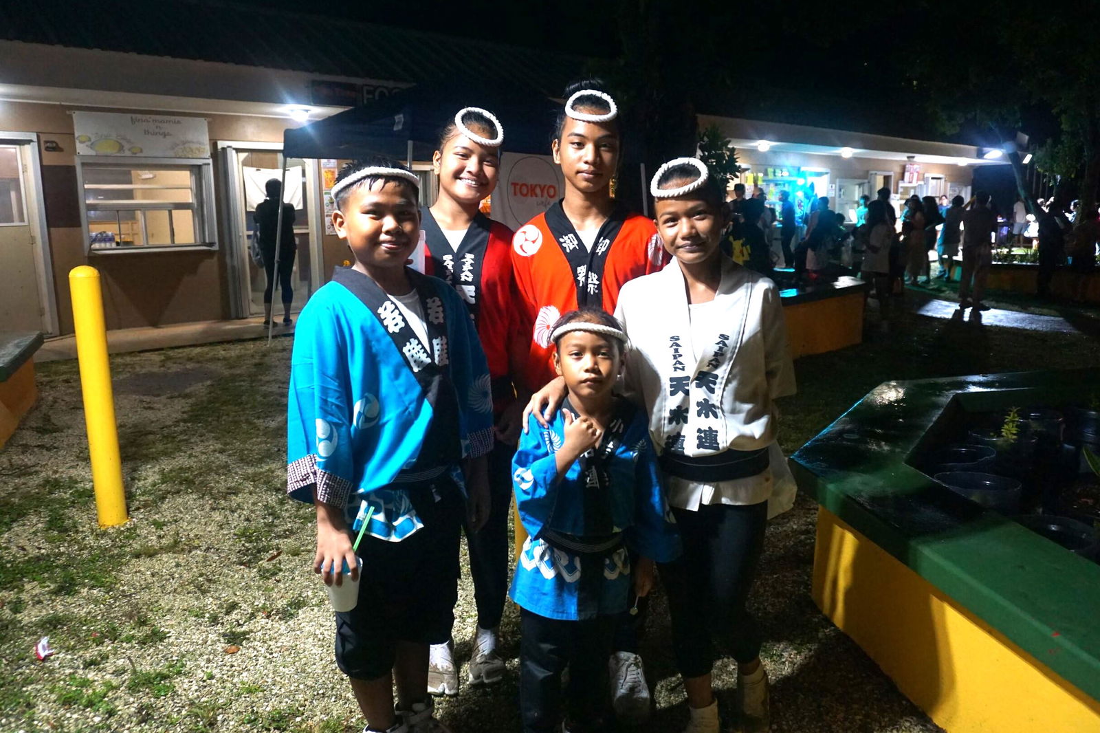Saipan Awaodori Team performers pose for a photo.