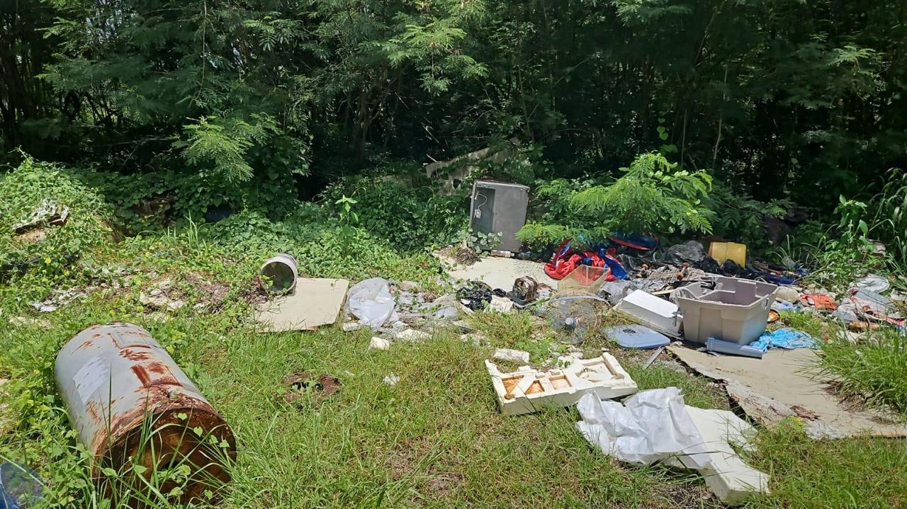 Household trash, including appliances, railings and plastic chairs, were found by hikers near the Japanese memorial in Marpi.
