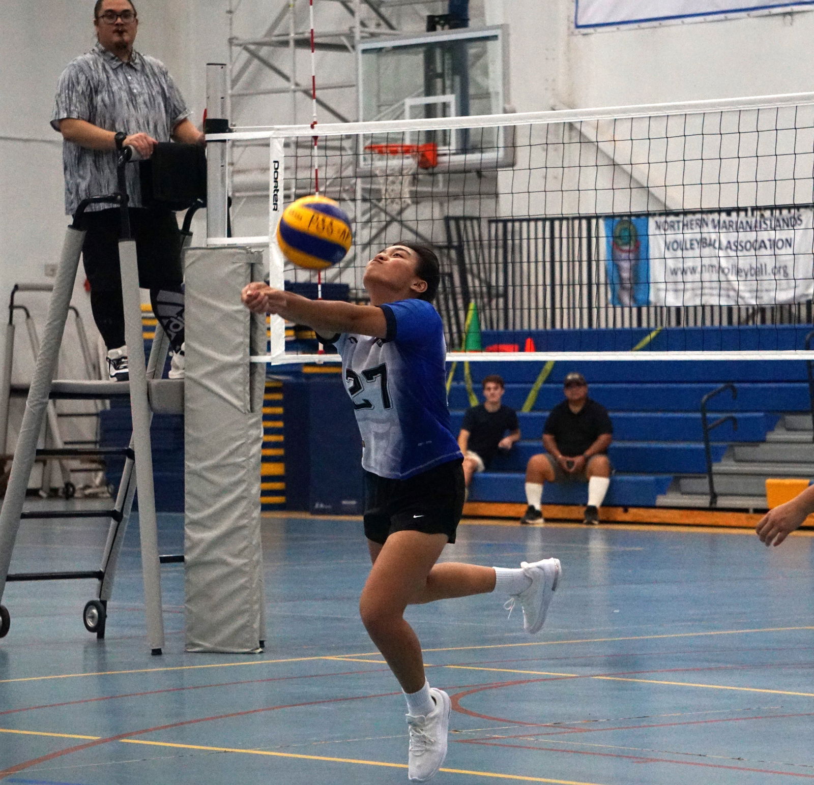 GCA's Eunice Pagaduan extends for the bump return against MHS at the MHS gym on Tuesday. 