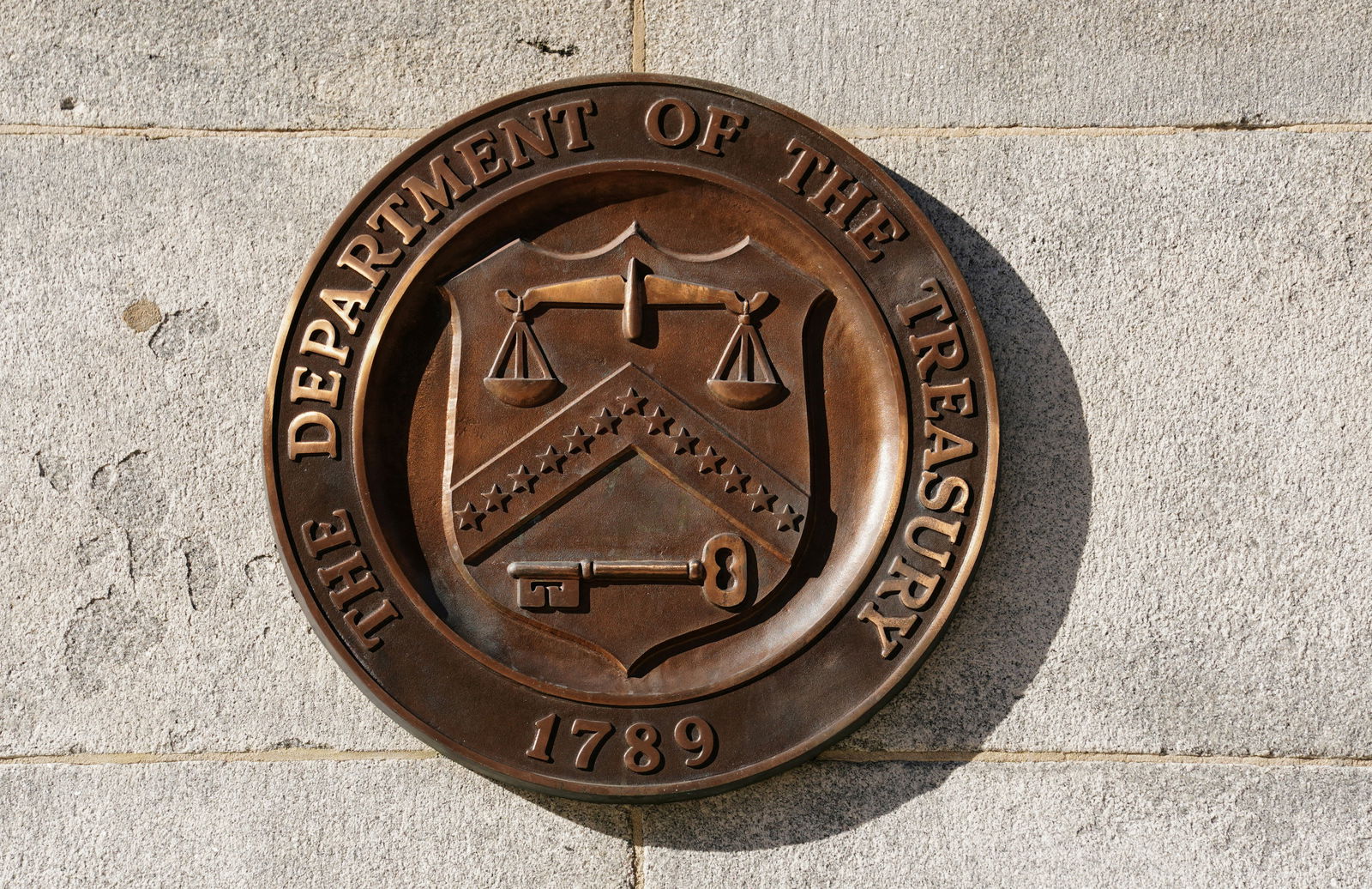 A bronze seal for the Department of the Treasury is shown at the U.S. Treasury building in Washington, D.C., Jan. 20, 2023.REUTERS