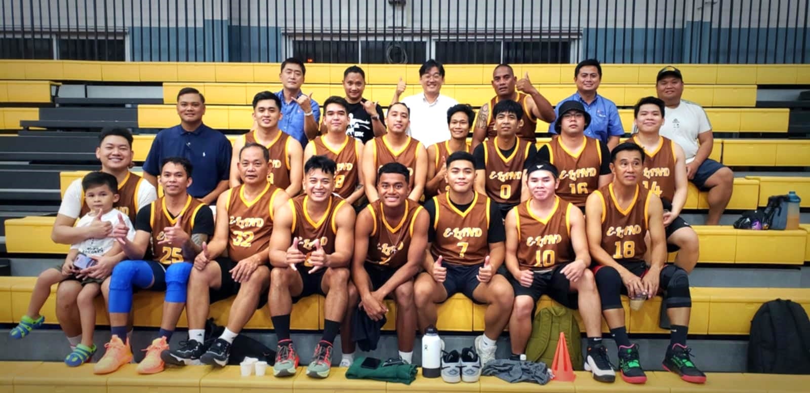 E-Land players pose for a group photo after beating CUC in the 2024 R&J Wine & Liquor Inter-Government/Business Basketball League at the Ada gym on Tuesday. 