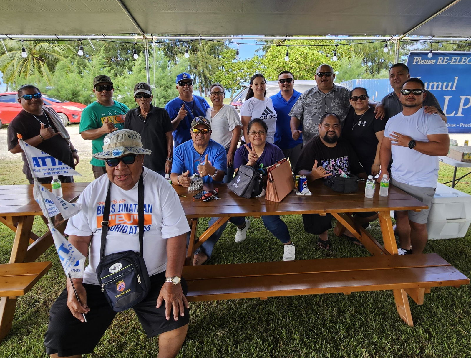 Independent House members John Paul Sablan of Precinct 2, Ralph Yumul of Precinct 3, Joel Camacho of Precinct 4, and Angelo Camacho of Precinct 5 pose for a photo with some of their supporters.