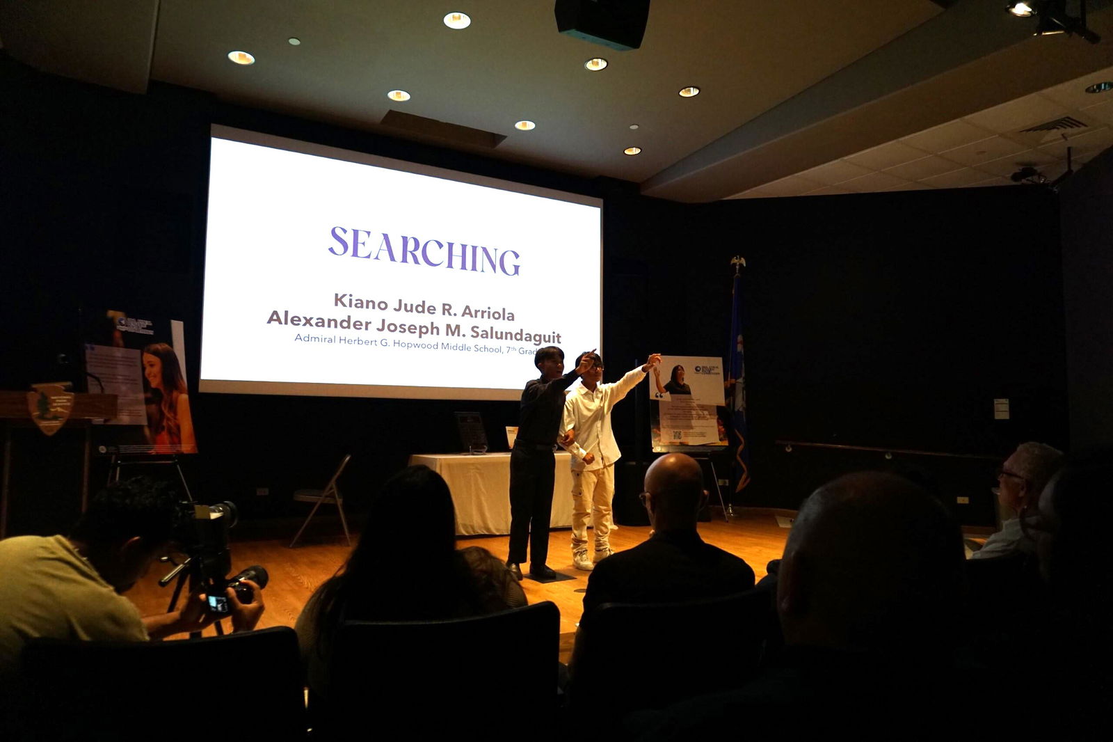 Kiano Arriola, right, and Alexander Salundaguit perform "Searching" at the Valetine N. Sengebau Poetry Competition. 