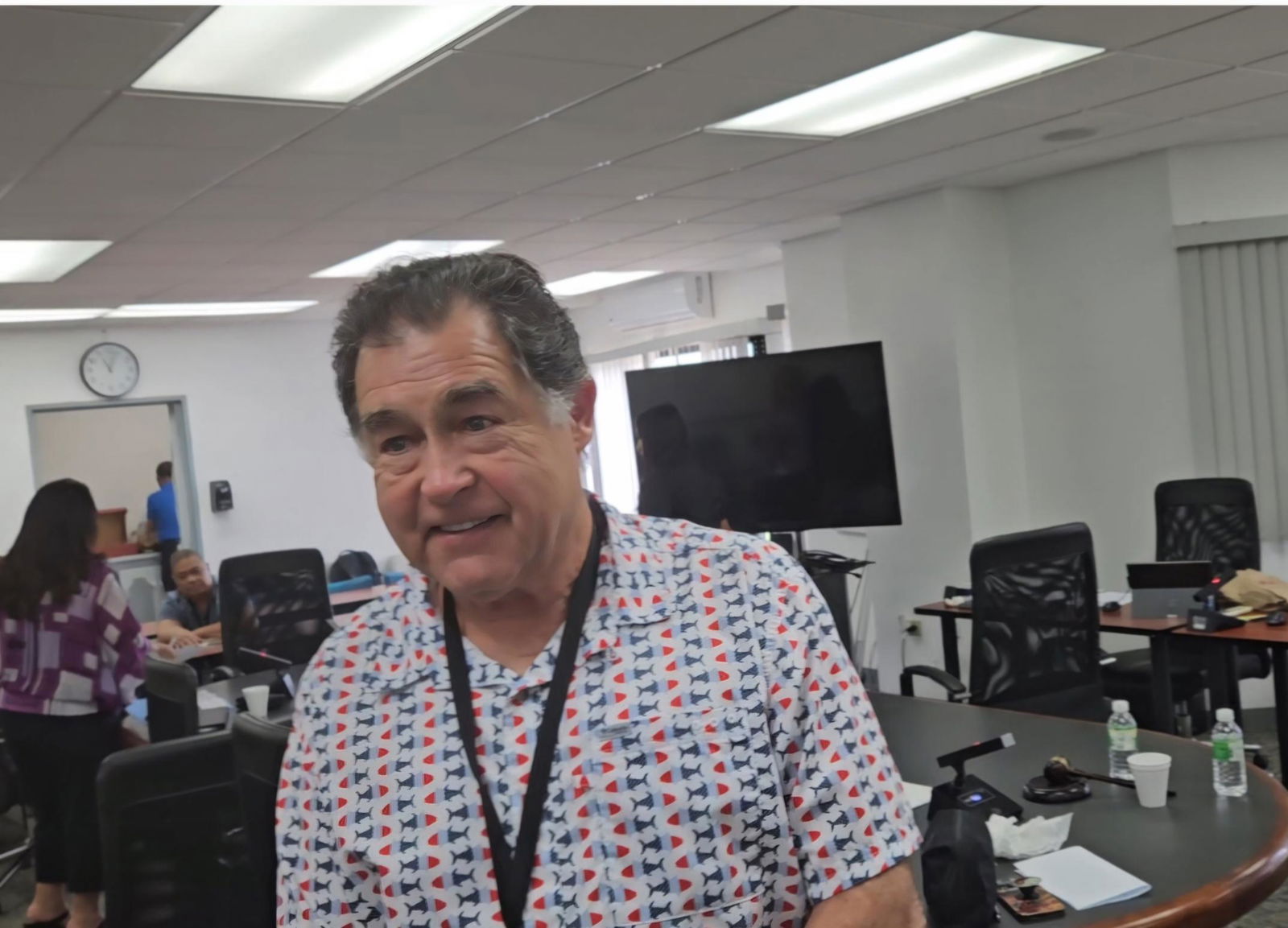 Commonwealth Utilities Corp.  Executive Director Kevin Watson talks to reporters during a break from a board meeting Friday.