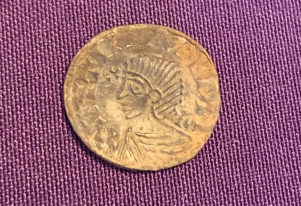 A view of a coin depicting King Sihtric Silkbeard, from a rare hoard of 1,000-year-old silver coins unearthed during metal-detecting, in Douglas, Isle of Man, in this handout released on Oct. 1, 2024.