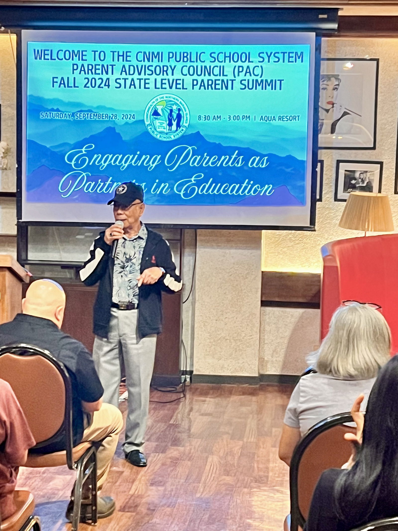 Board of Education member Daniel O. Quitugua of Rota deliver his remarks at the Parent Summit.