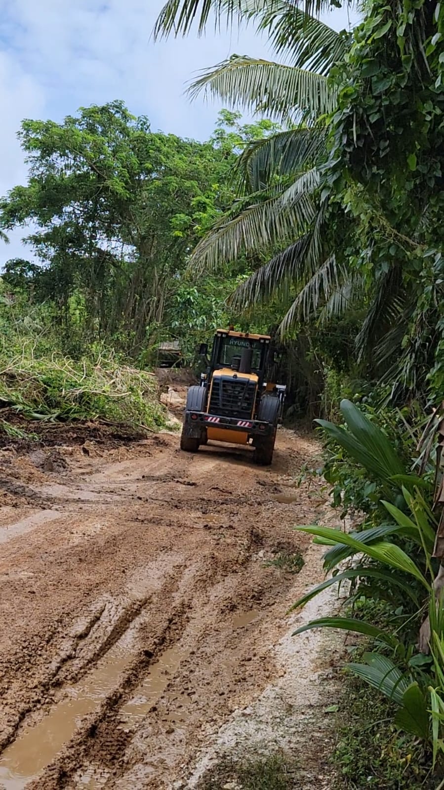 Saipan Mayor’s Office personnel repair a road in Chalan Kiya on Sunday.