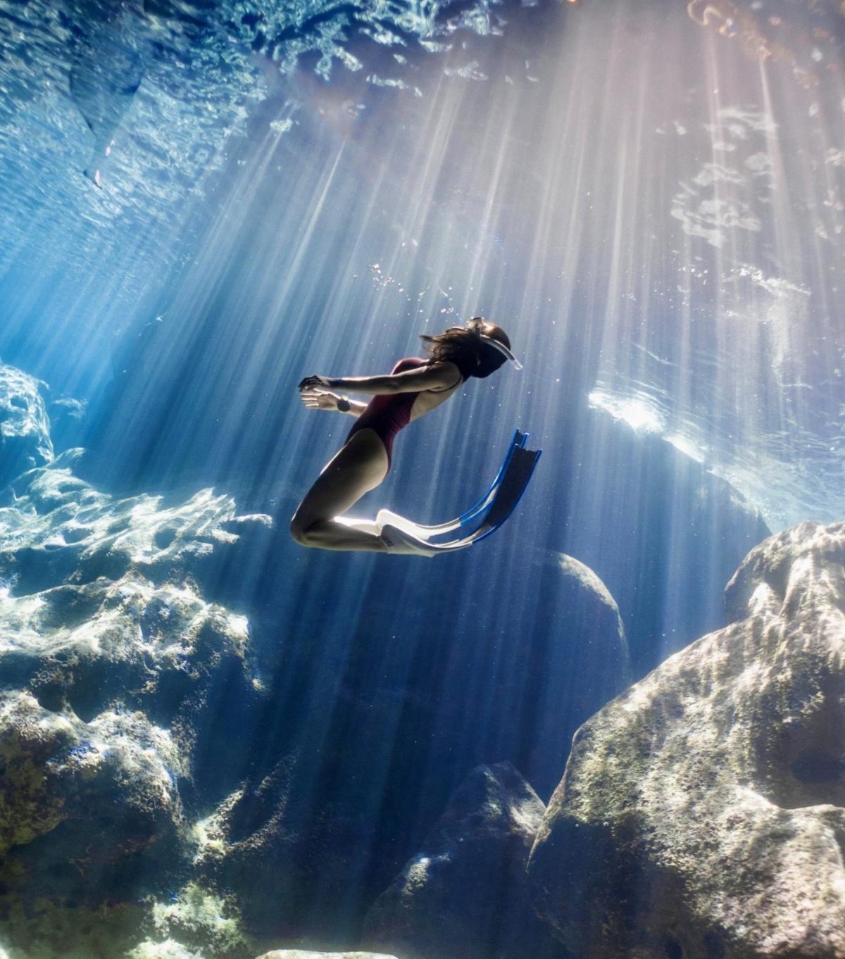 A freediver hangs in the water and light of the underwater cavern Grotto in Saipan. Through Nov. 15, 2024, the Marianas Visitors Authority is accepting original videos of up to 60-seconds filmed in the Marianas for its “Show Us Your Marianas Adventure” social media contest.