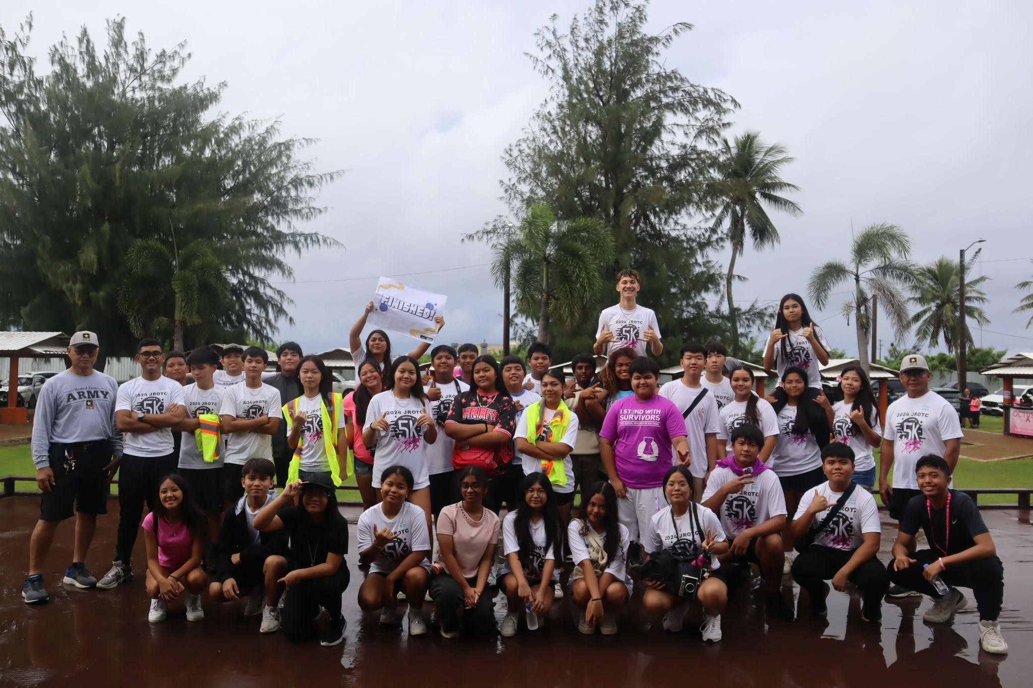 Stallion Battalion volunteers at the 5K 5K Run, Walk, & Wheel pose for a group photo at the end of the event.
