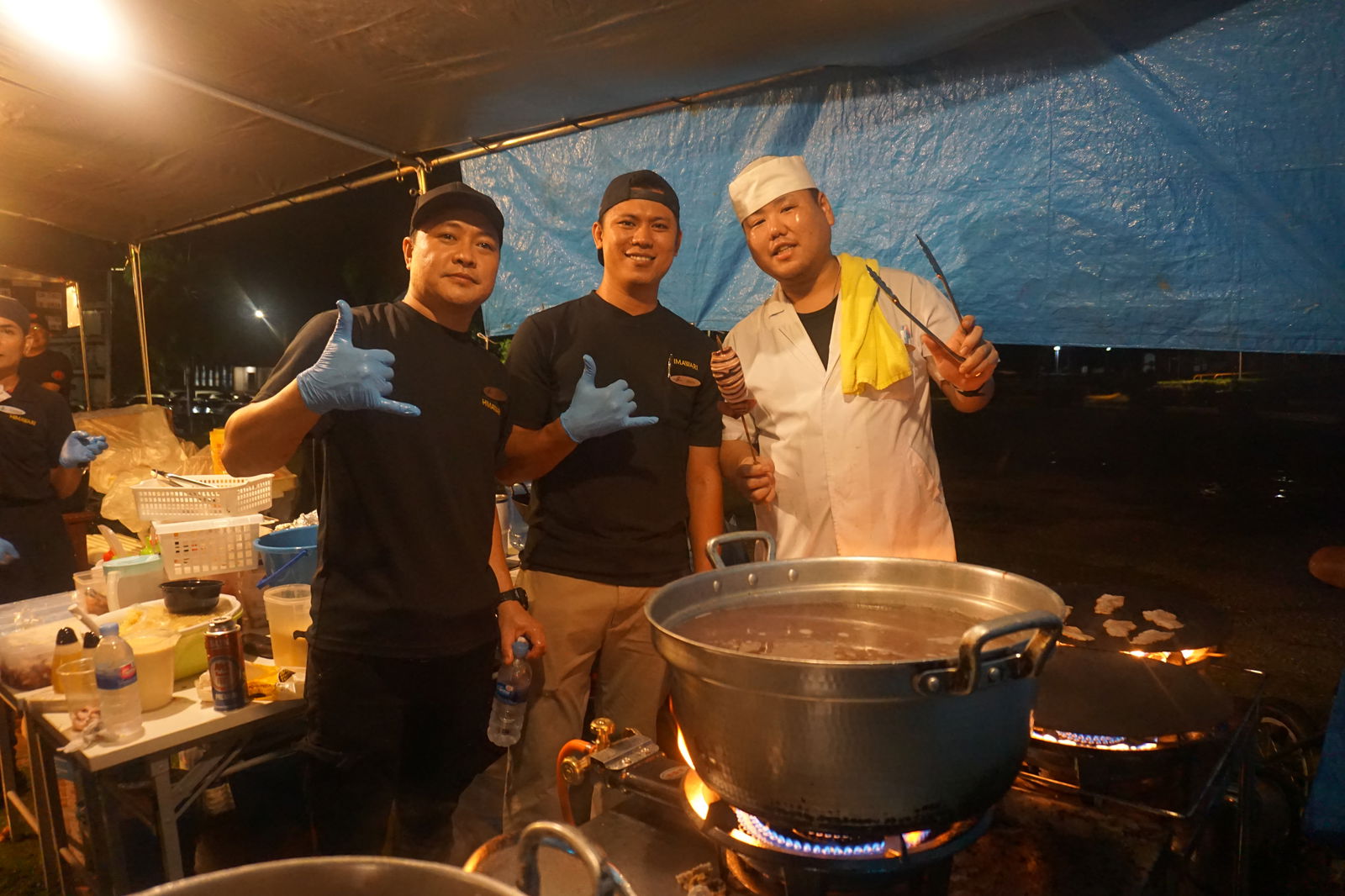 Himawari staff members pose with Chef Ryuta Yoshimoto, right.