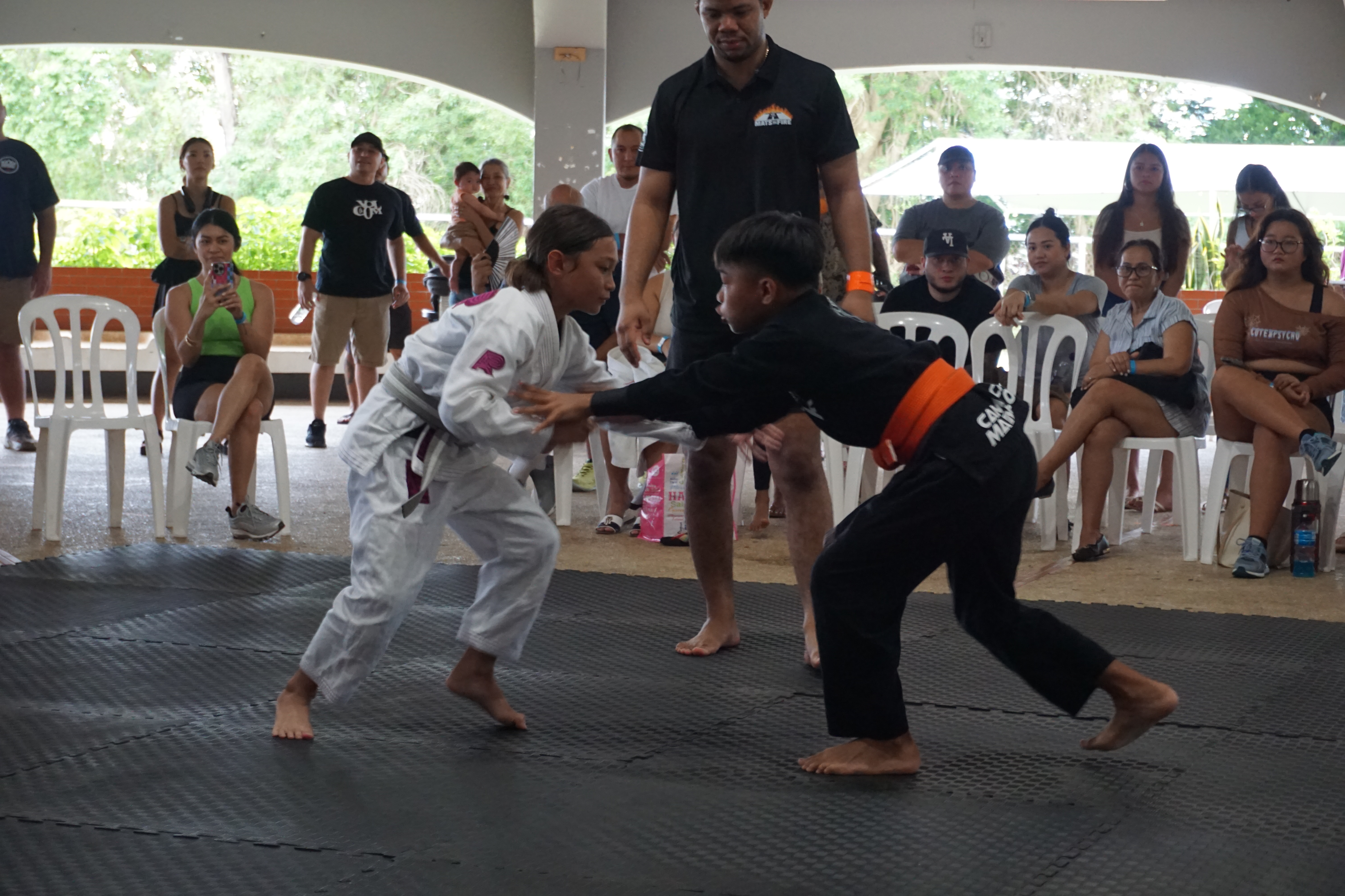 Reiden Travilla, left, ​Tate Manglona, right.