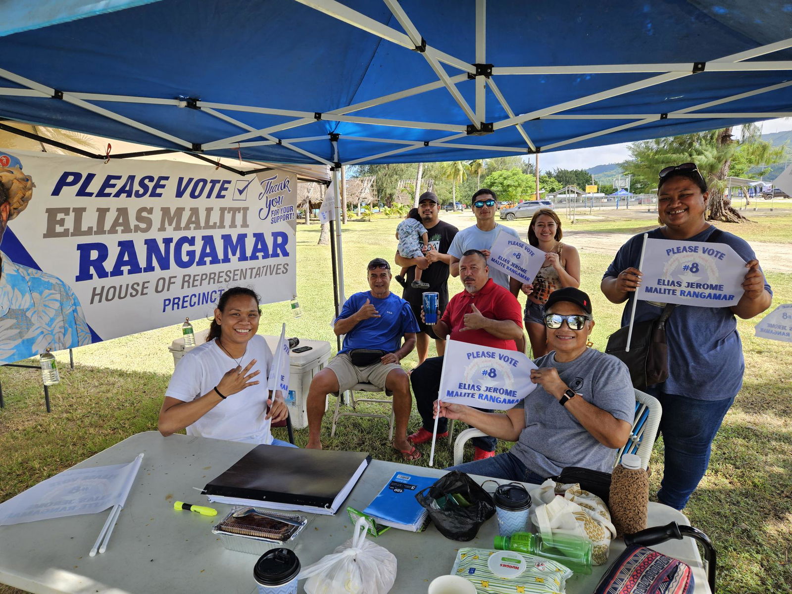 Coach Elias “Eli” Rangamar, in blue shirt, 2nd left, an independent House candidate in Precinct 3 with his supporters.