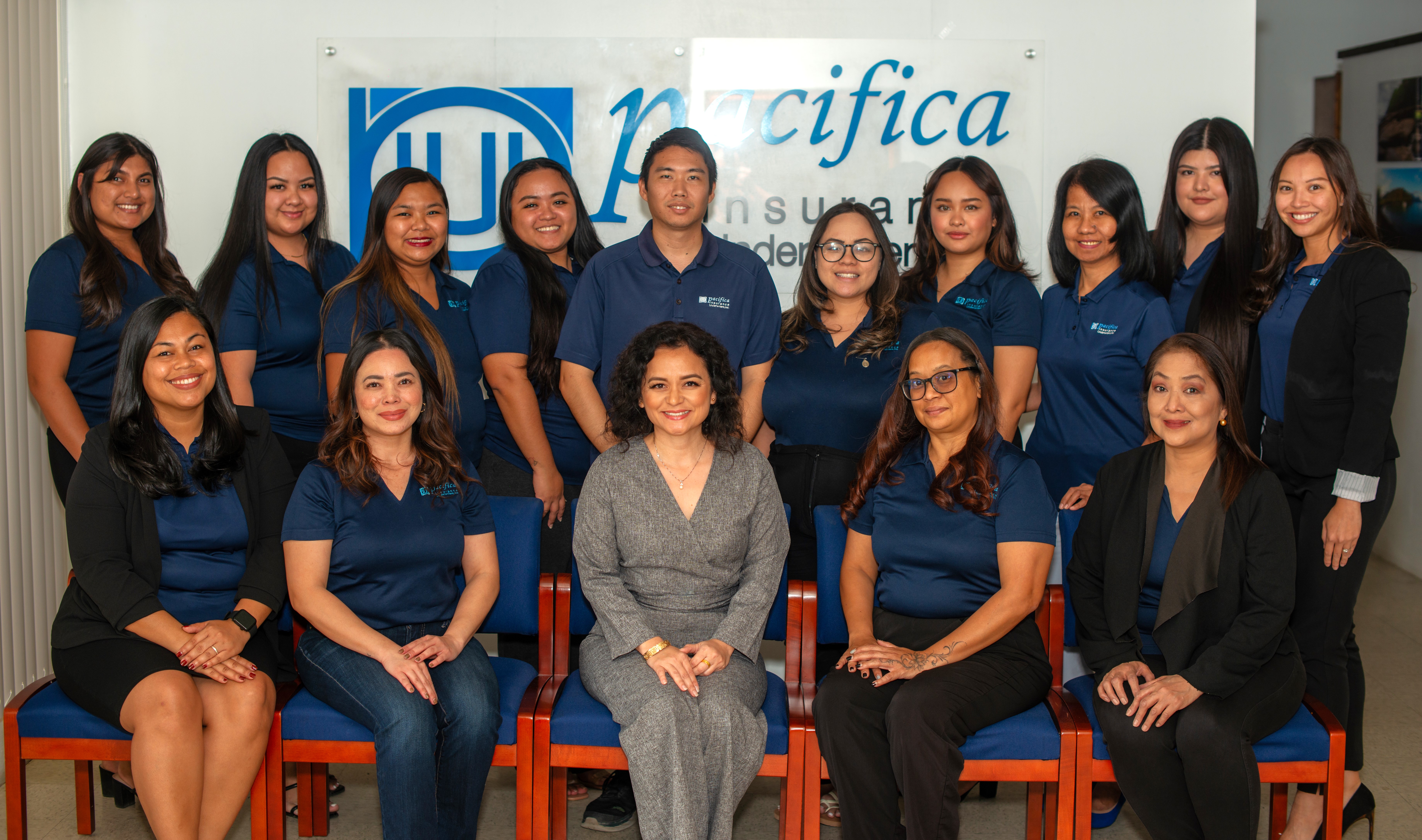 The Pacifica Insurance Underwriters Inc. team is led by President and Chief Executive Officer Shirley Sablan, seated center.