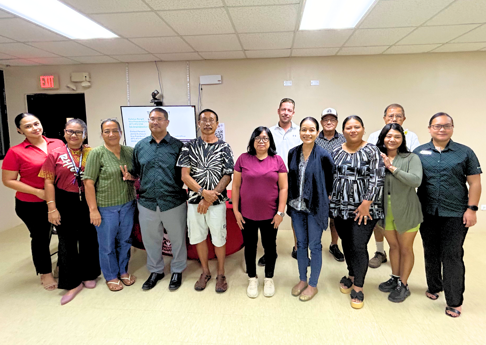Training attendees gather for a photo with Charlene M. Ogo, Rota SBDC director/business advisor, extreme left, and Kalistus Rengiil, credit manager at the Bank of Guam, fourth left.