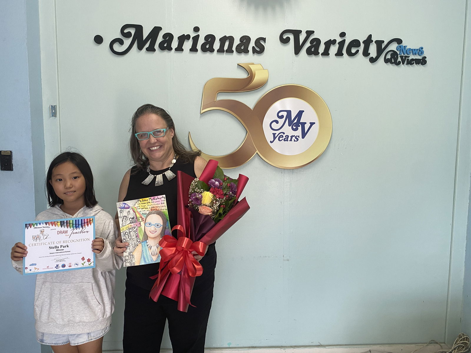Stella Park, left, and Amie McRoberts of Saipan International School. 