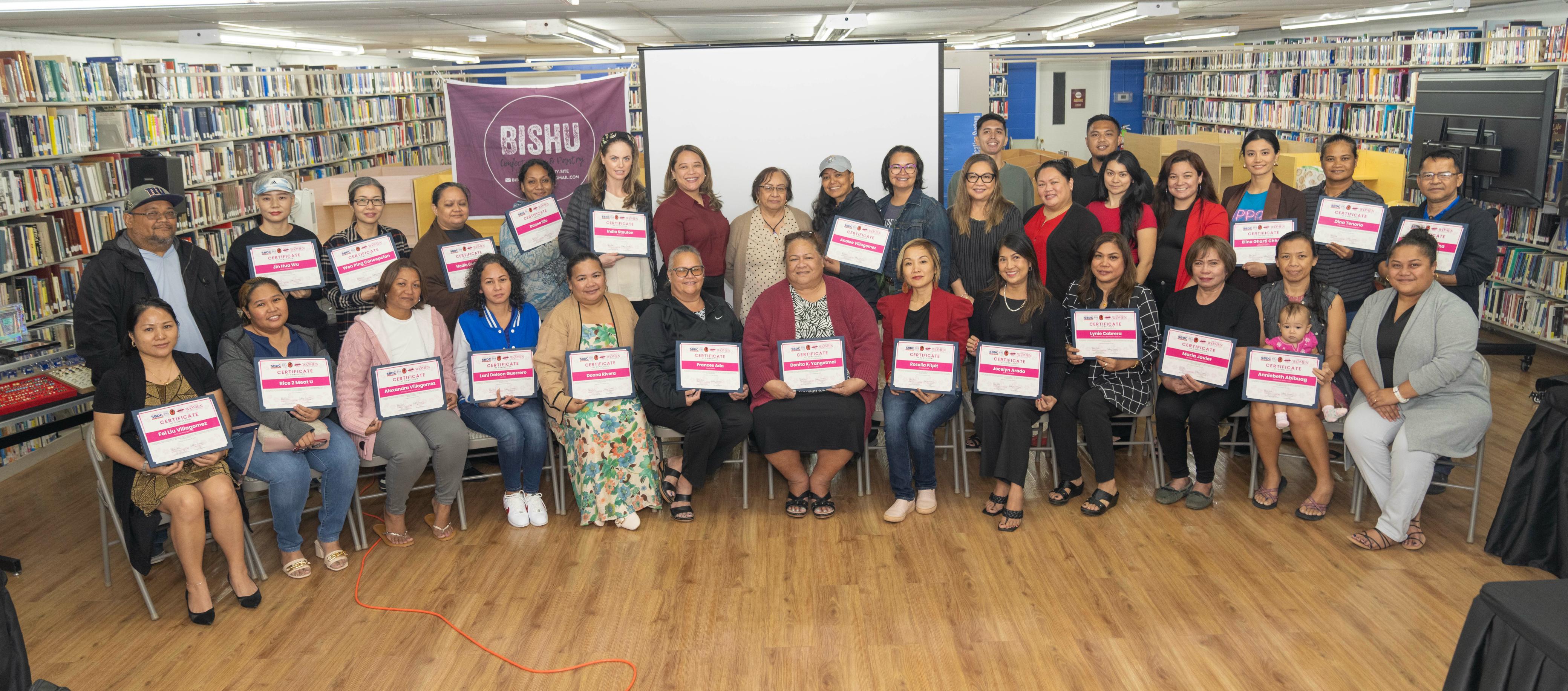 Cohort 4 Women Entrepreneurship Project participants gather for a group photo with representatives from CNMI SBDC.