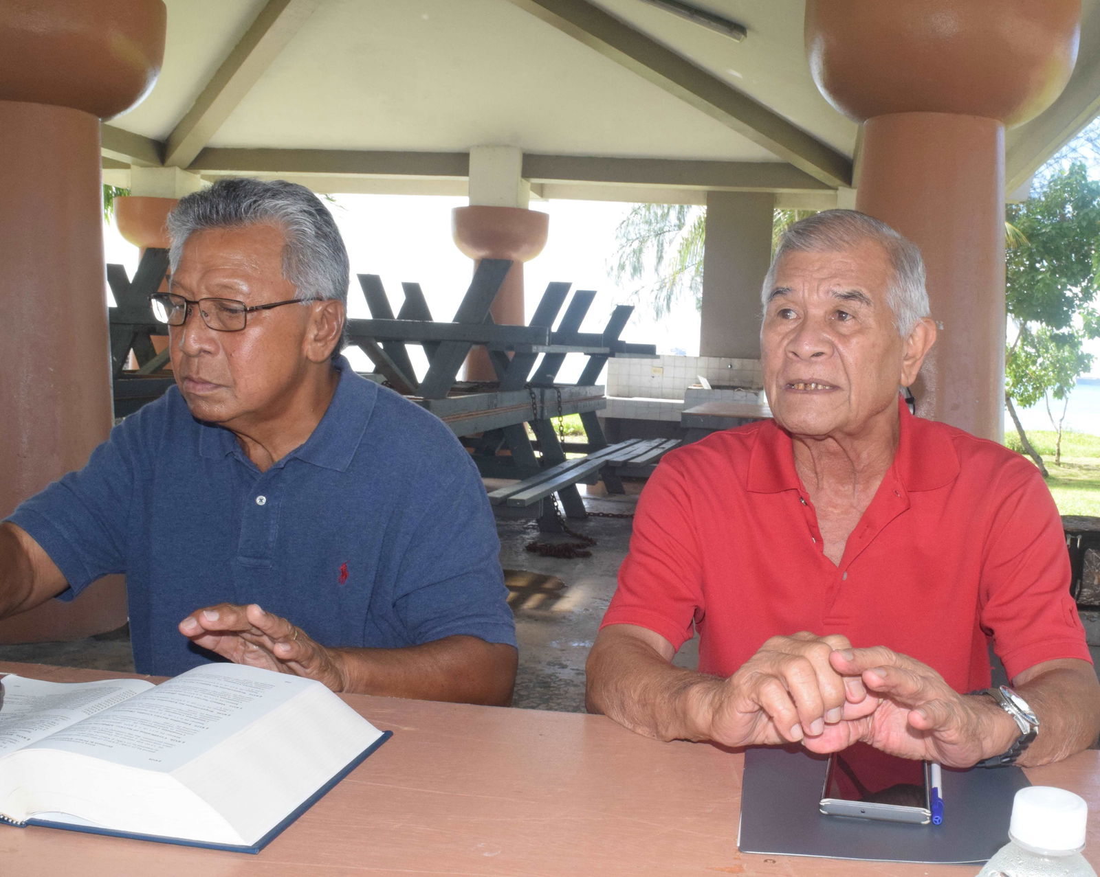Commonwealth Retirees Association President Juan I. Tenorio, right, and Secretary Mario Taitano conduct a press conference at the Carolinian Village pavilion in Garapan on Thursday.