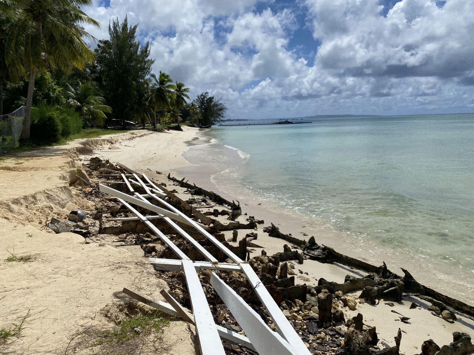 World War II debris can be seen on the shore of the beach near the former Hyatt hotel in Garapan.