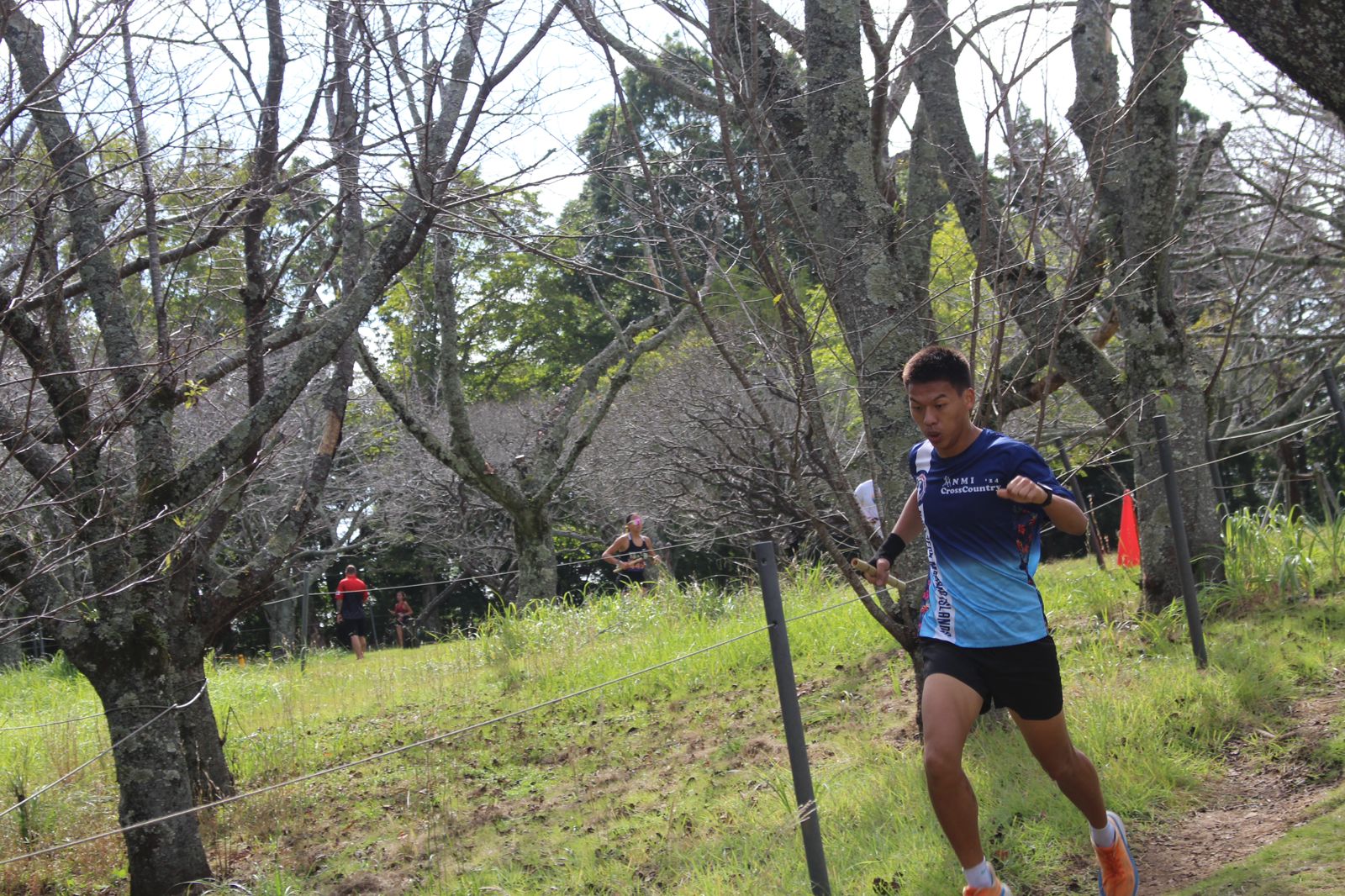 Samuel runs down the hill.