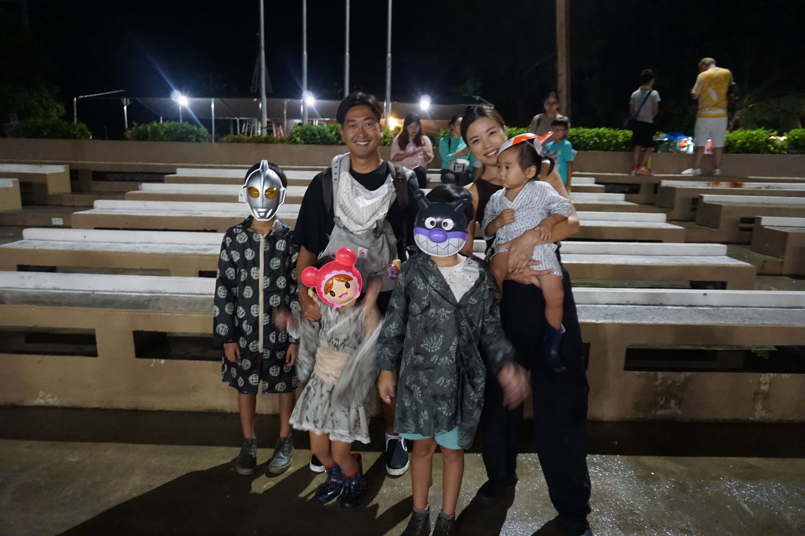 A family poses for a photo during the Autumn Festival at Sugar King Park.