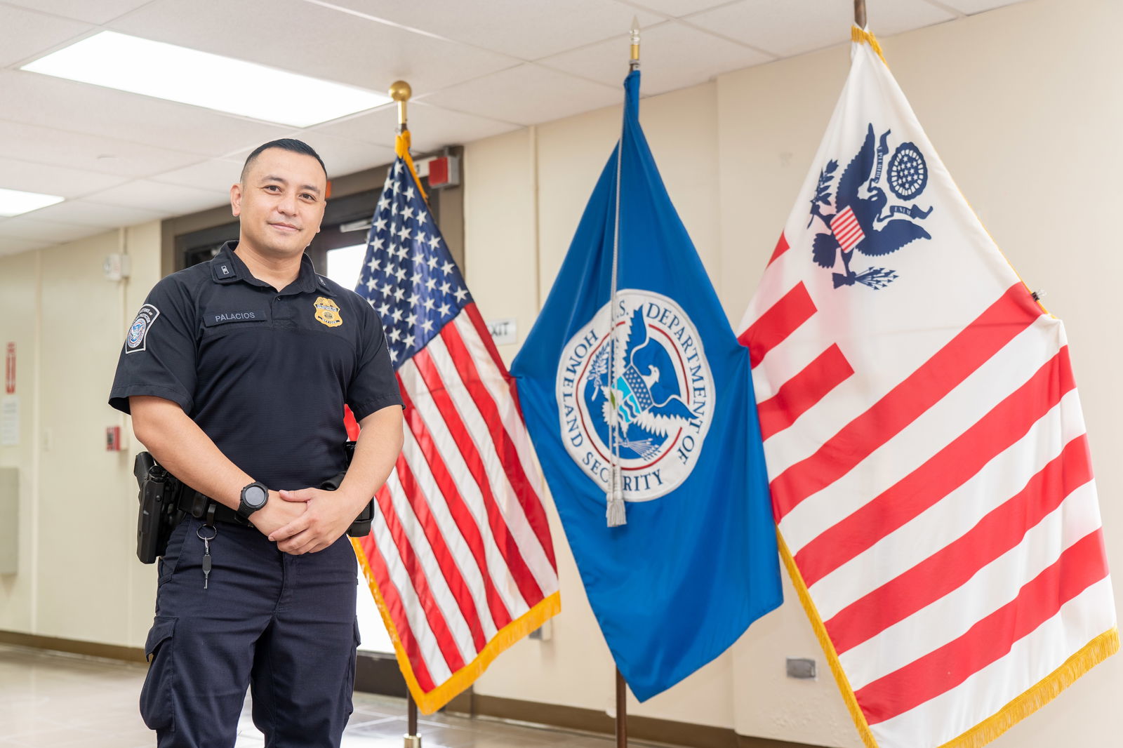 Keane T. Palacios at his workplace as a U.S. Customs and Border Protection officer with the Department of Homeland Security.