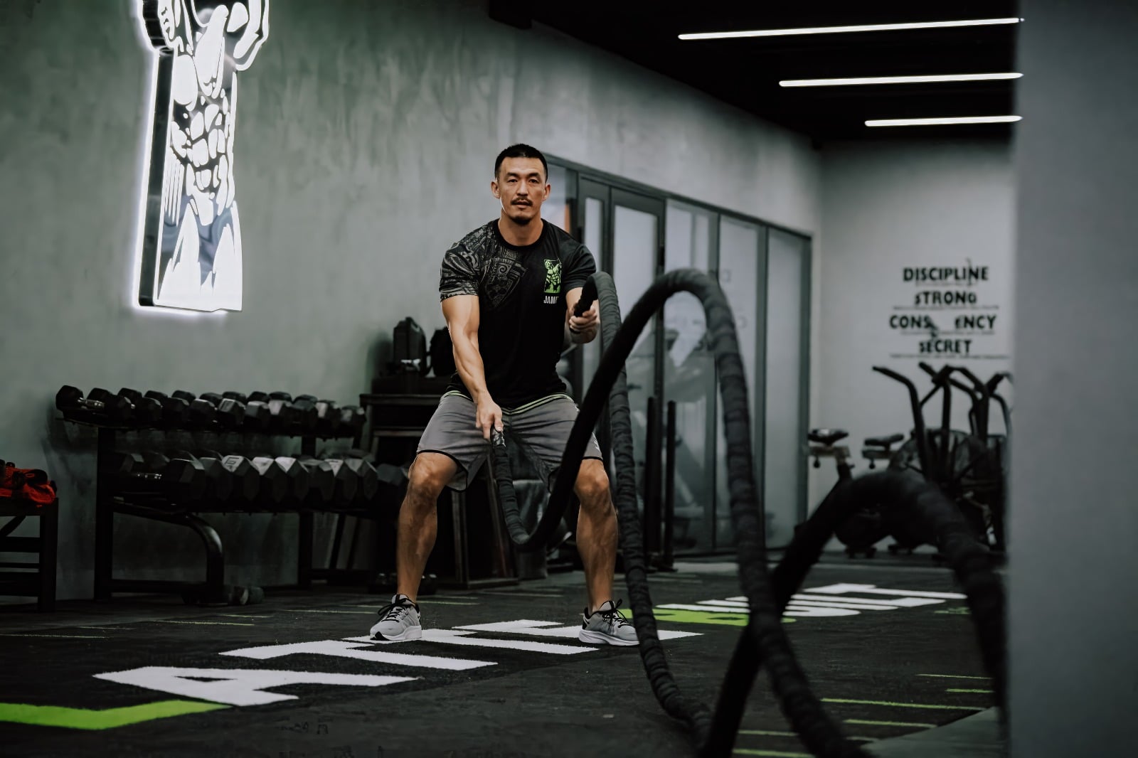 James Lee conducts the 5 a.m. Club class at Latte Built 24hrFitness on Beach Road in Chalan Kanoa.