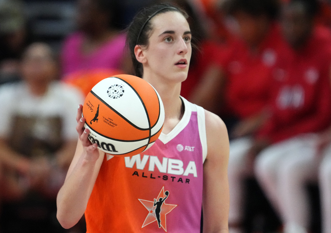 Team WNBA guard Caitlin Clark (22) dribbles against the USA Women's National Team during the WNBA All Star Game at Footprint Center in Phoenix, Arizona, July 20, 2024.