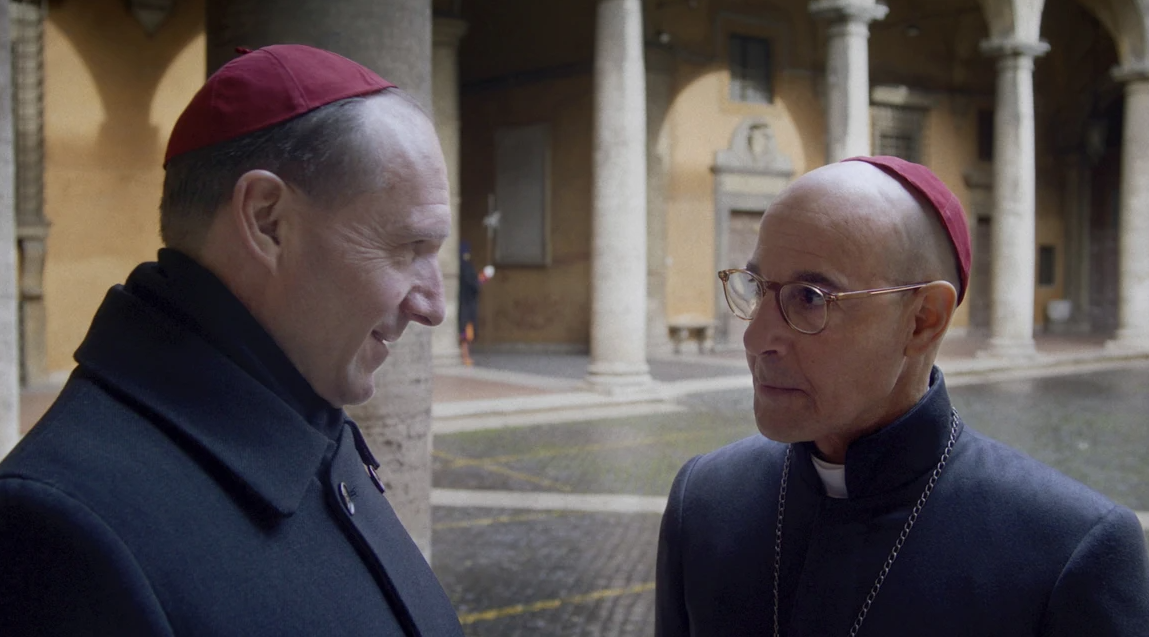 Ralph Fiennes, left, and Stanley Tucci in a scene from “Conclave.”