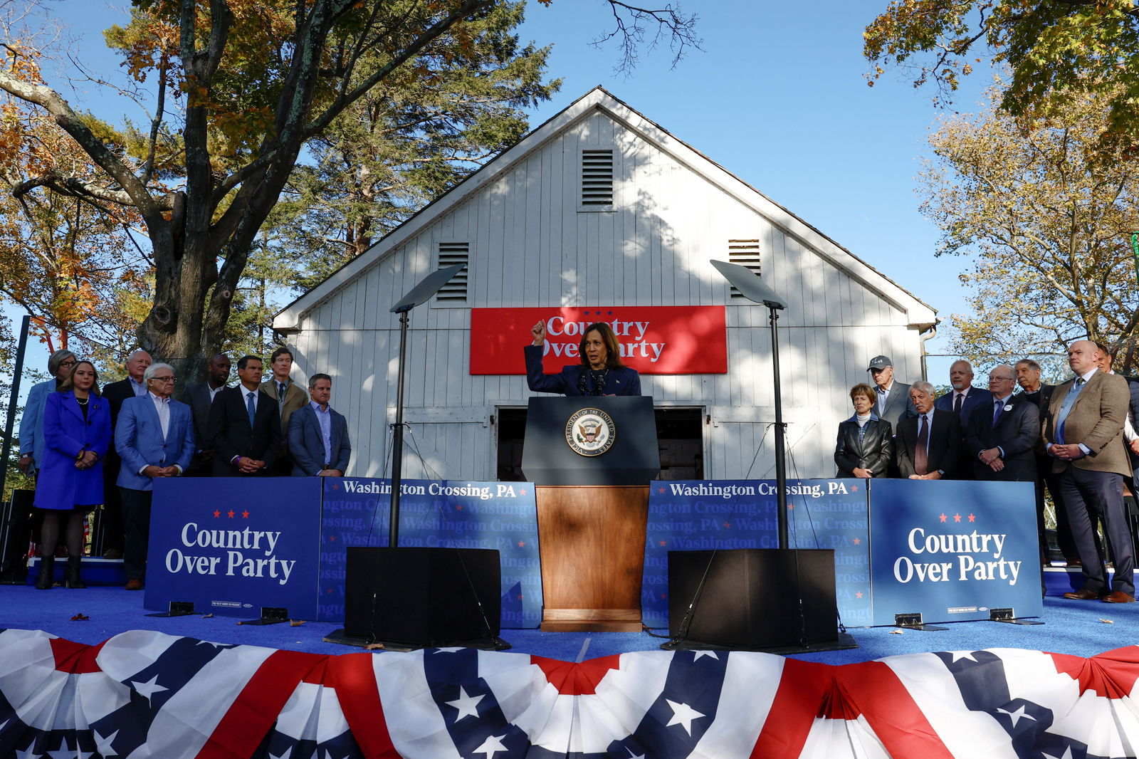 Democratic presidential nominee President Kamala Harris speaks during a campaign event, as Republicans stand on stage with her, in Washington Crossing, Pennsylvania, Oct. 16, 2024.