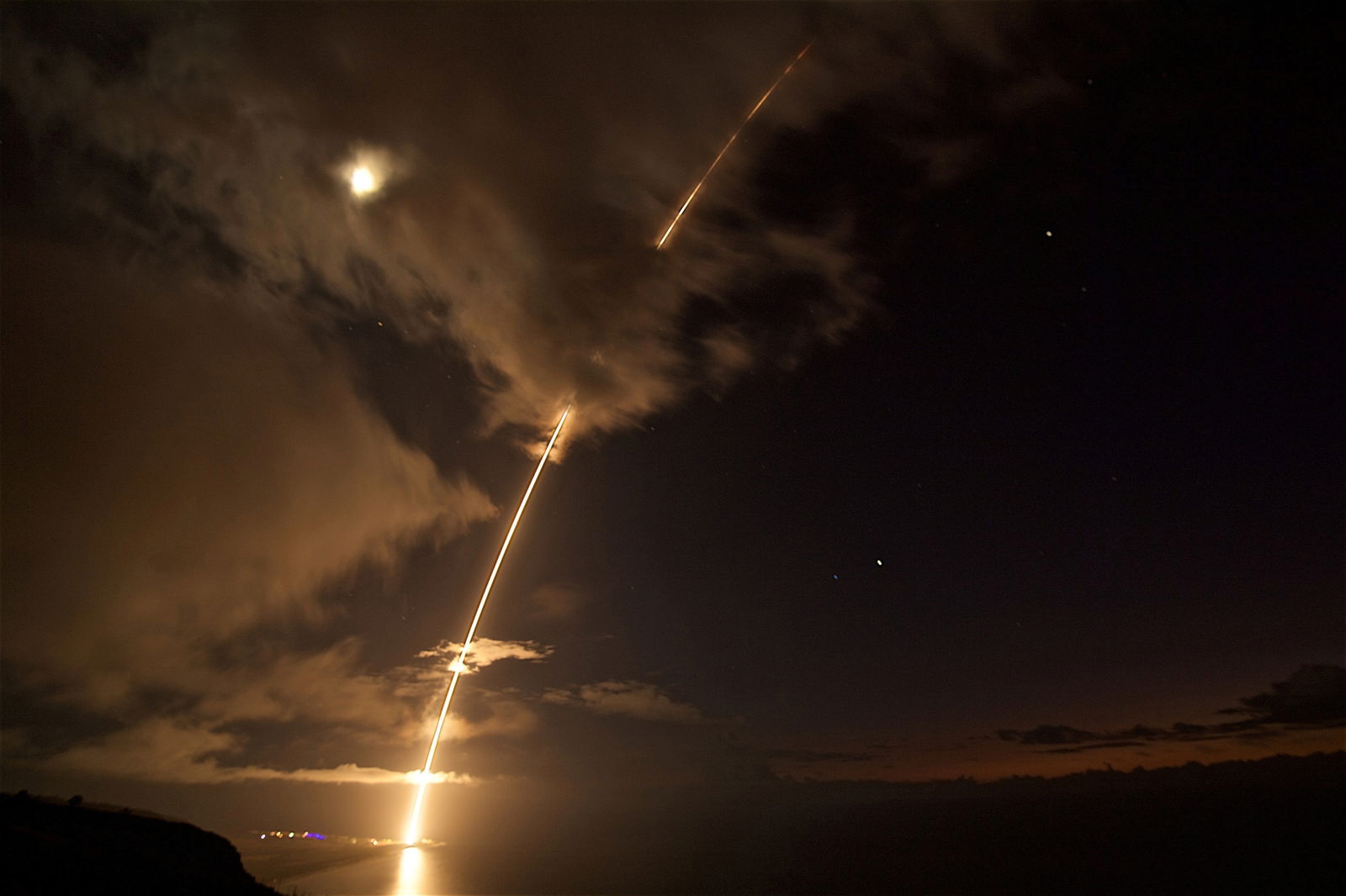 A medium-range ballistic missile target is launched from the Pacific Missile Range Facility, before being successfully intercepted by Standard Missile-6 missiles fired from the guided-missile destroyer USS John Paul Jones, in Kauai, Hawaii, Aug. 29, 2017.