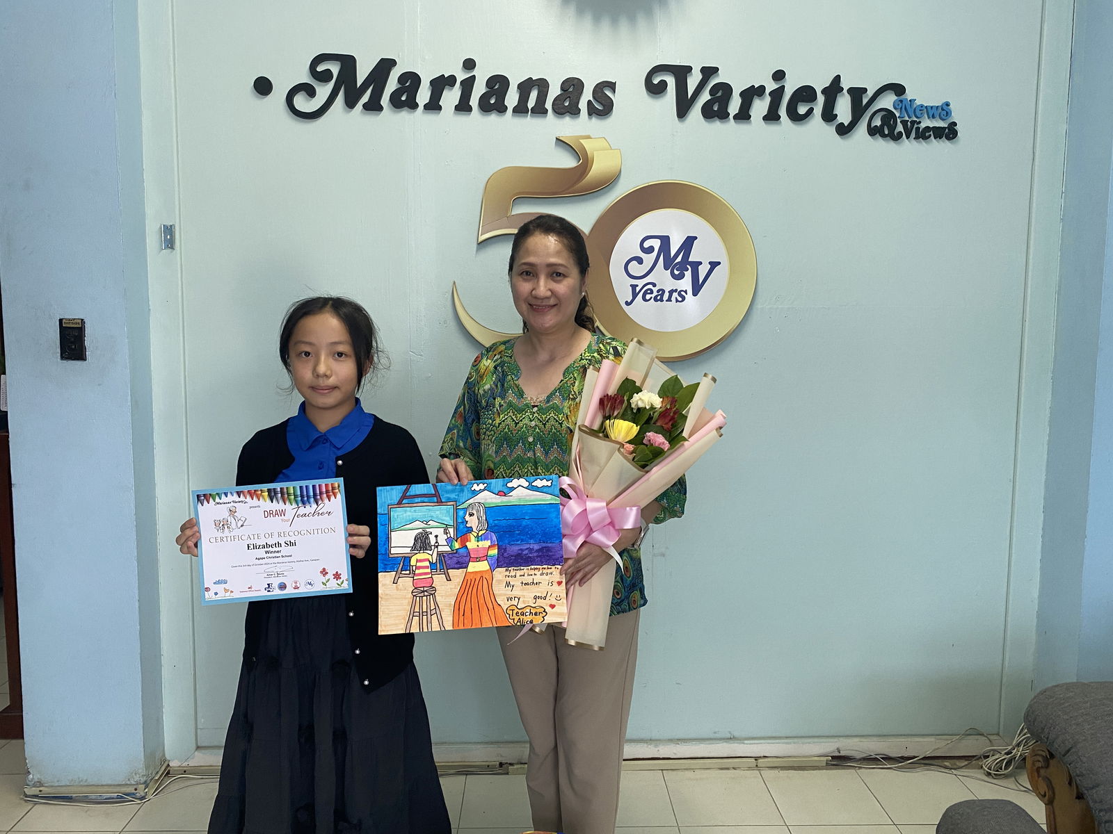 Elizabeth Shi, left, and teacher Ms. Alice from Agape Christian School.