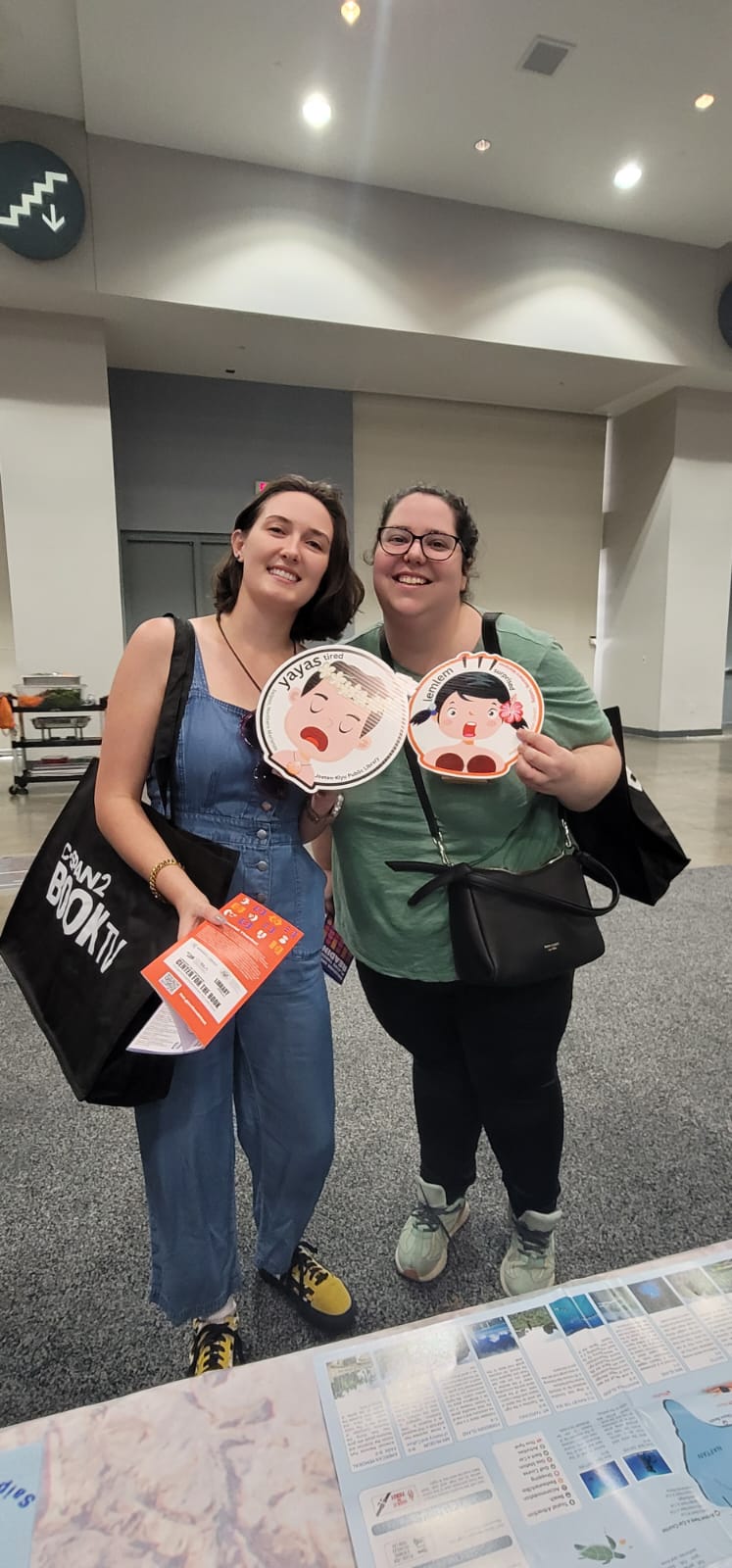 Visitors are all smiles at the JKPL booth at the National Book Festival in Washington, D.C.