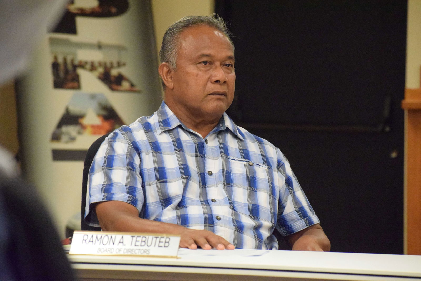 CPA board member Ramon A. Tebuteb listens during a special meeting.