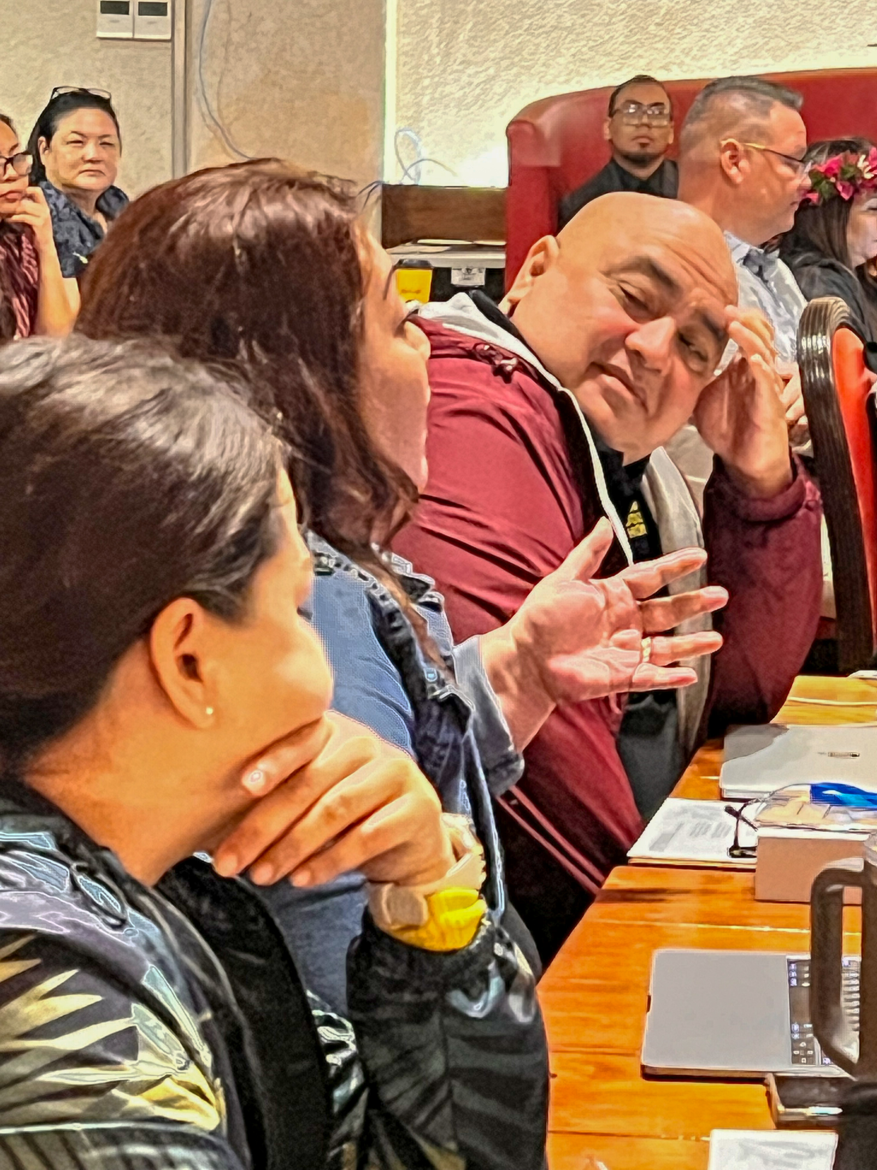 Marianas High School Principal Melanie Sablan Rdiall gestures while speaking as other public school principals listen.