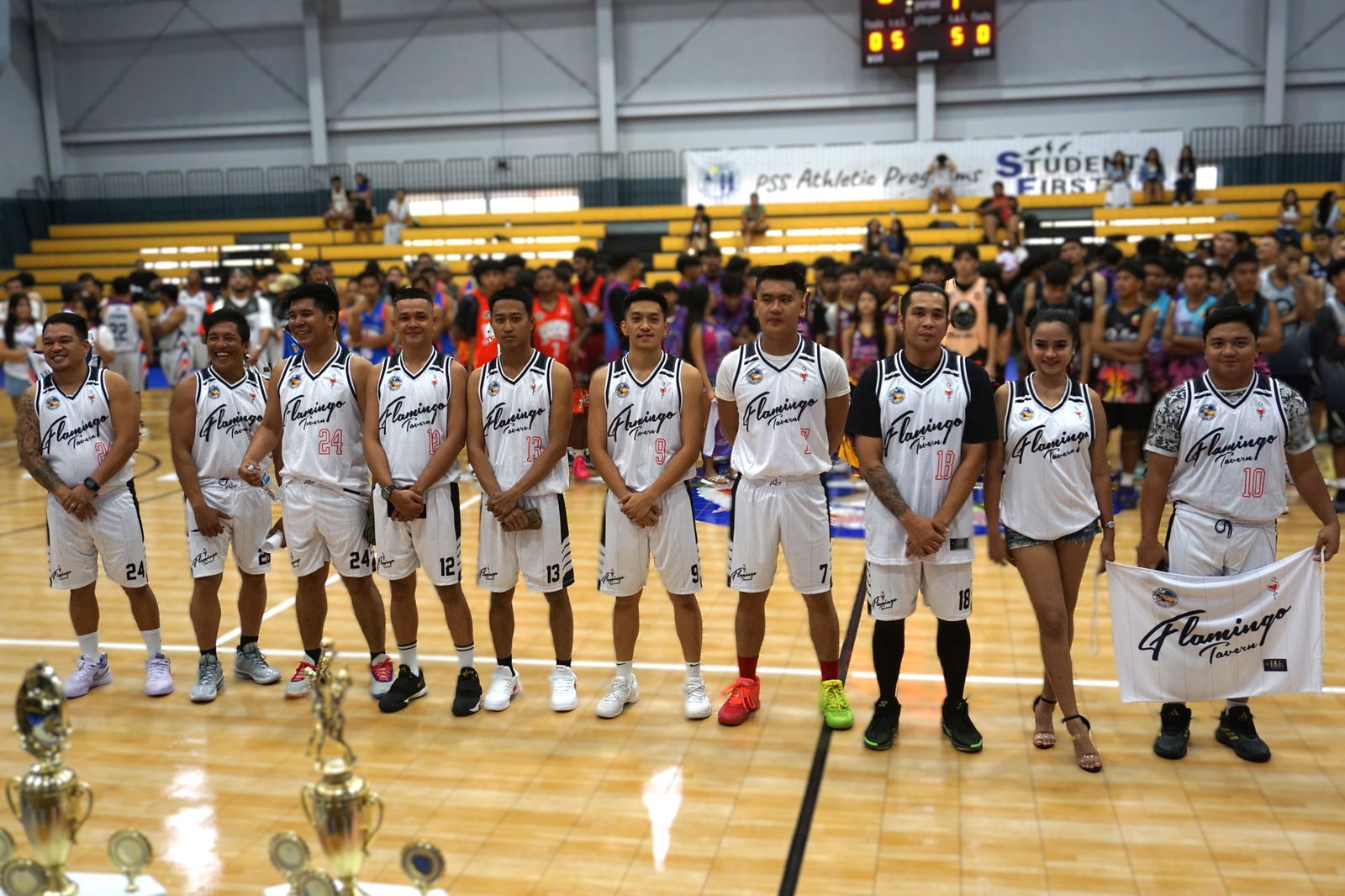 Flamingo Tavern players pose for a group shot during the opening ceremony of the 2nd Saipan Magalahi Eagles Club – Saipan MagaHaga Lady Eagles Group Basketball Tournament 2024 at the Ada gym on Sunday. 
