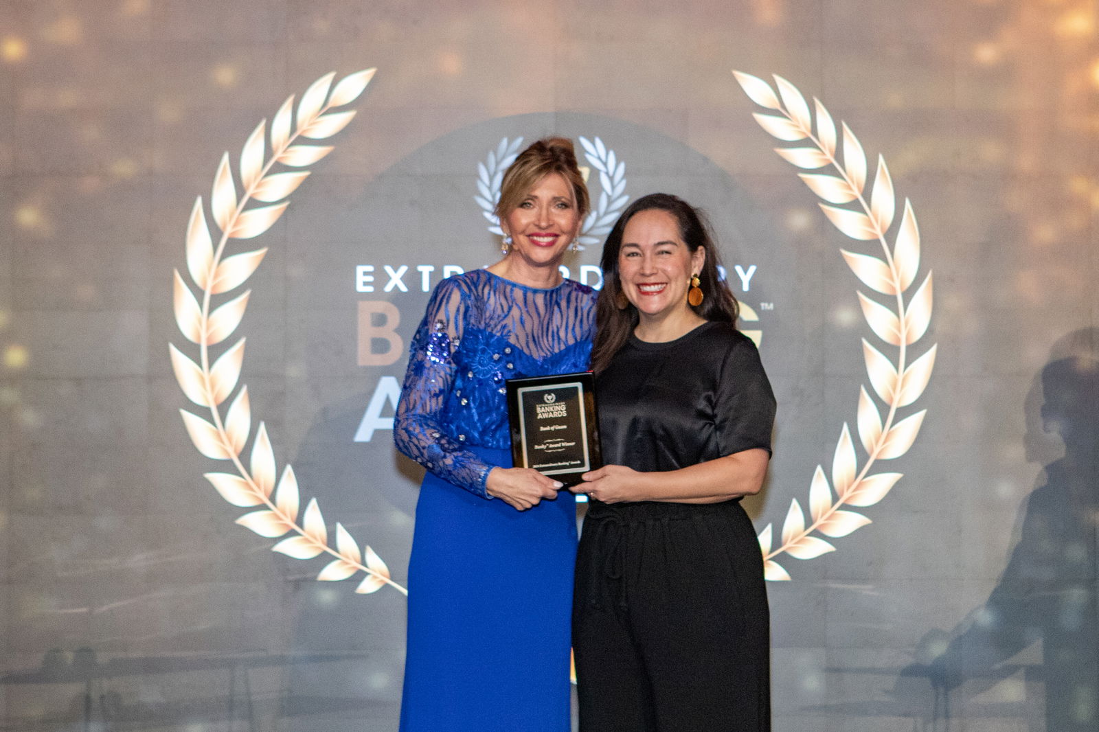 Bank of Guam received three awards from The Institute for Extraordinary Banking including the Banky Award, Money Smarts Banky Award for Financial Literacy Education, and the BanksGiving Banky Award for Philanthropy. Pictured, from left, Roxanne Emmerich, chair and founder, The Institute for Extraordinary Banking, and Maria Eugenia H. Leon Guerrero, executive vice president and chief operating officer, Bank of Guam.