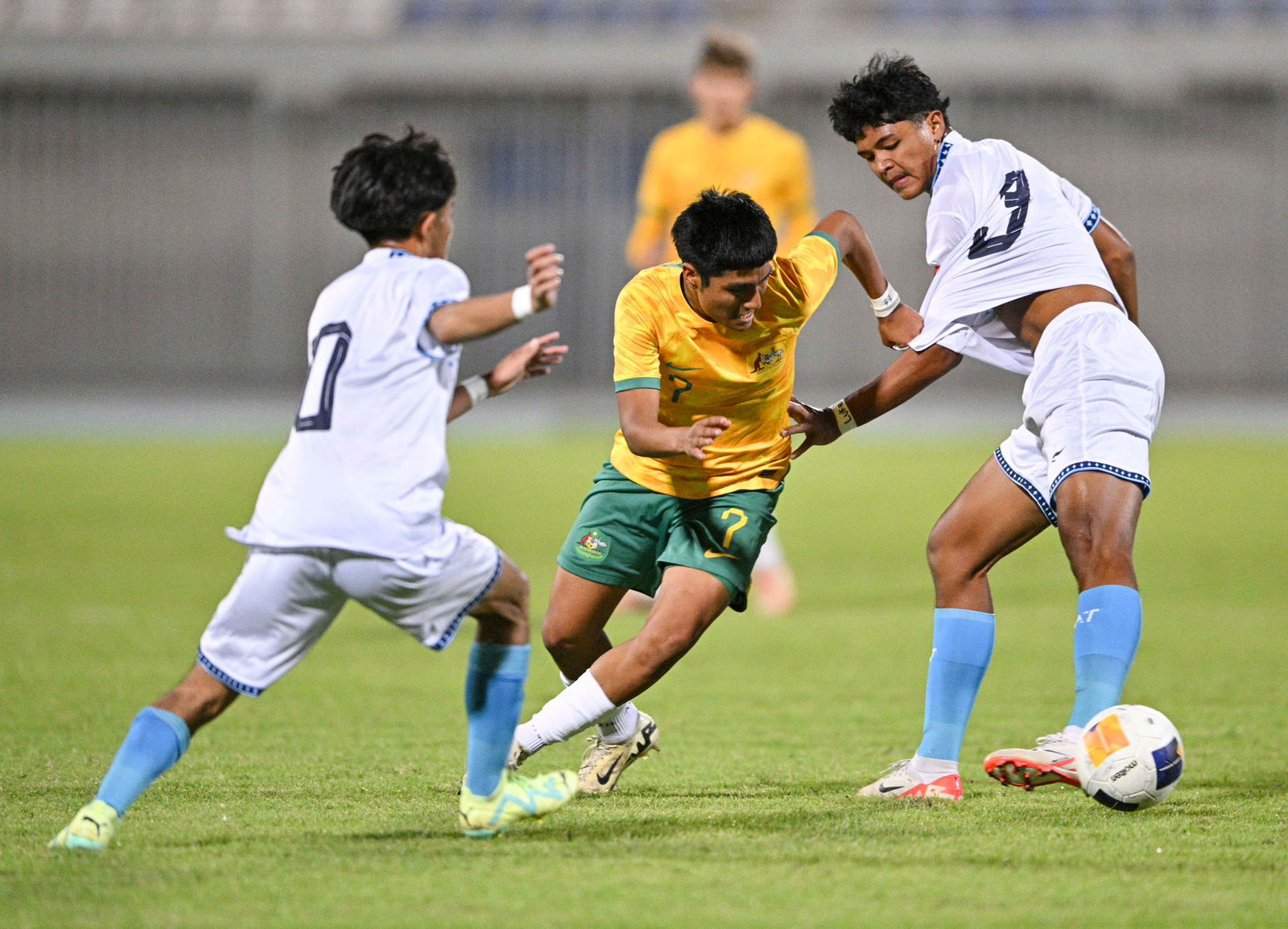 NMI U17 Men's National Team members Nolan Ngewakl and Mark Costales battle for possession against Australia during their debut match in the Asian Football Confederation U17 Asian Cup 2025 Qualifiers at the Abdullah Al Khalifa Stadium in Salmiya, Kuwait on Thursday, CNMI time.