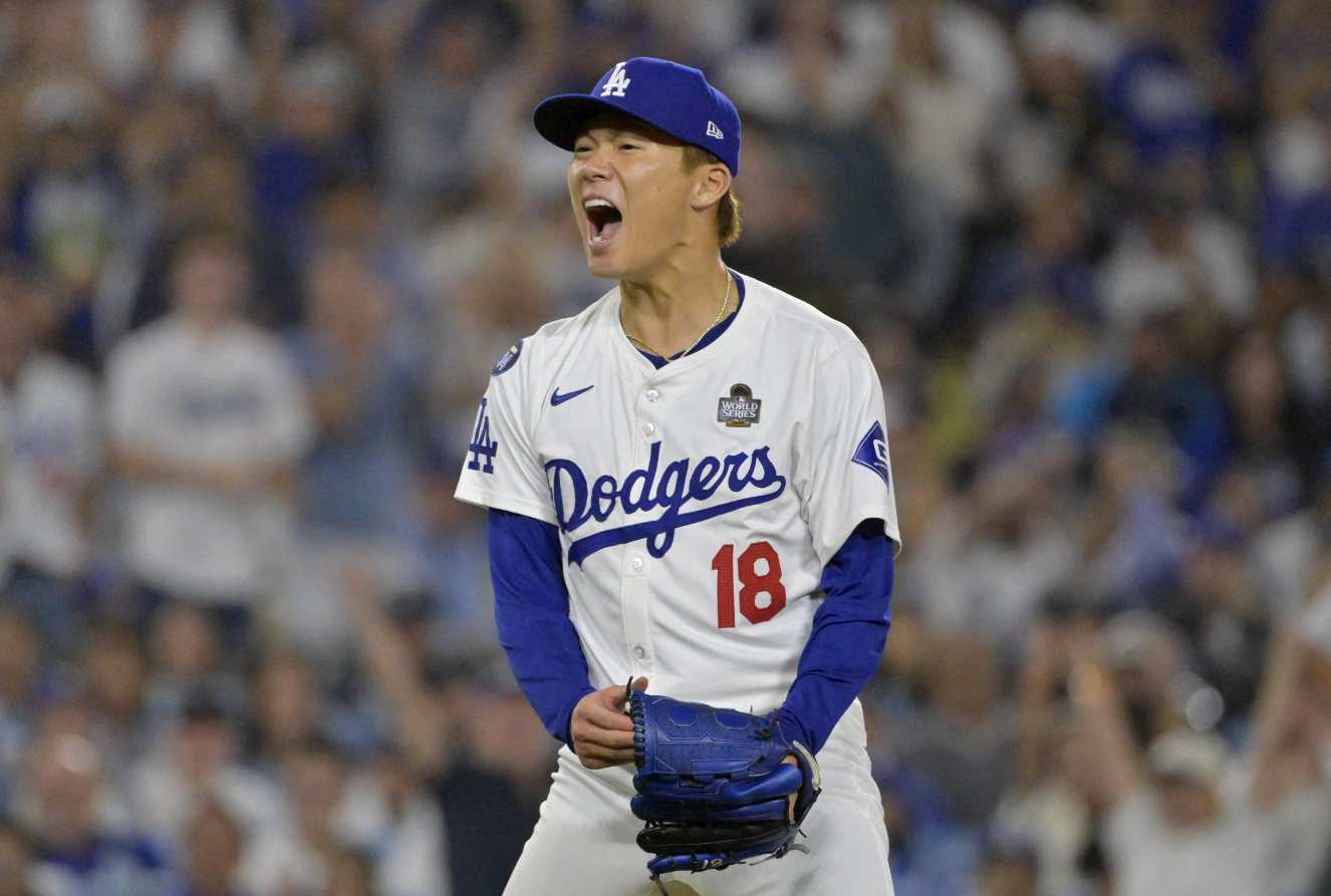 LA Dodgers pitcher Yoshinobu Yamamoto reacts in the fourth inning against the New York Yankees during Game 2 of the 2024 MLB World Series.