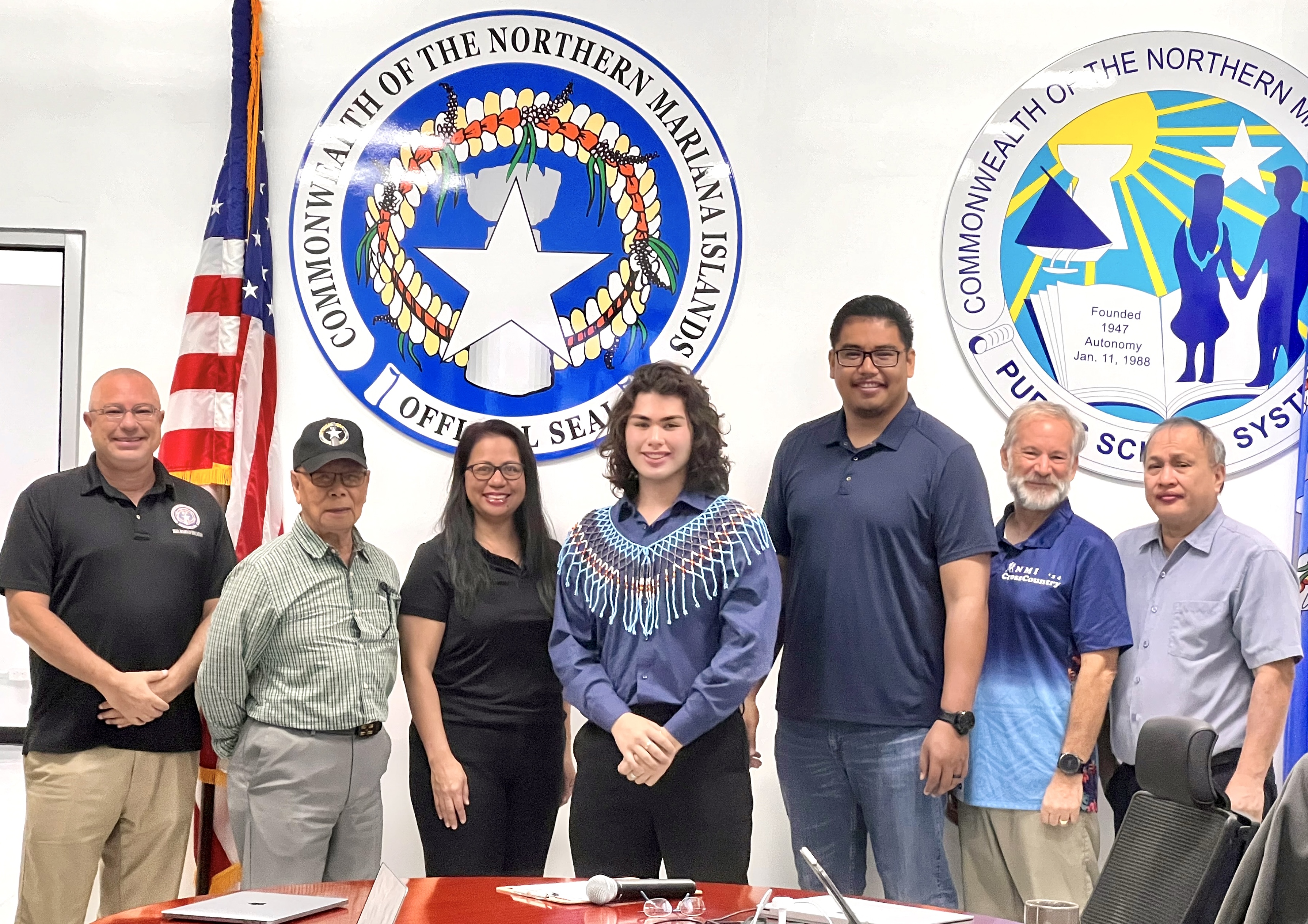 Kagman High School junior Vinnie Juan Q. Sablan, center, was sworn in as the new student representative to the Board of Education. Also in photo: BOE Chair Gregory Pat Borja, Vice Chair Maisie B. Tenorio, Secretary-Treasurer Andrew L. Orsini, Board Member Antonio L. Borja, Board Member Daniel Quitugua, and Non-Public School Representative Dr. Ron Snyder. Teacher Representative Dr. Dora Miura attended via online. 