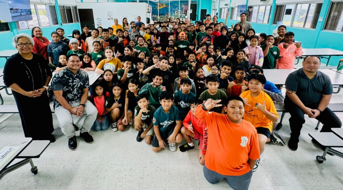 Students at Oleai Elementary School learn about The Marianas tourism industry on Oct. 30, 2024, from Marianas Tourism Education Council Board Chair Vicky Benavente, front left, and other representatives of MTEC and the Marianas Visitors Authority at the school in Oleai, Saipan.