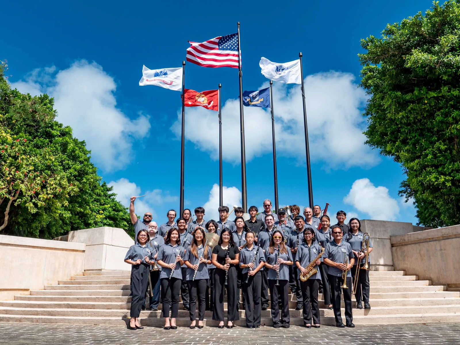 Members of the Saipan Pacific Winds Concert Band pose for a photo after a Veterans Day performance.