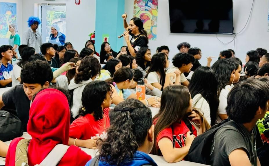 Students at Oleai Elementary School learn about The Marianas tourism industry on Oct. 30, 2024, from Marianas Tourism Education Council Board Chairw Vicky Benavente, front left, and other representatives of MTEC and the Marianas Visitors Authority at the school in Oleai, Saipan.