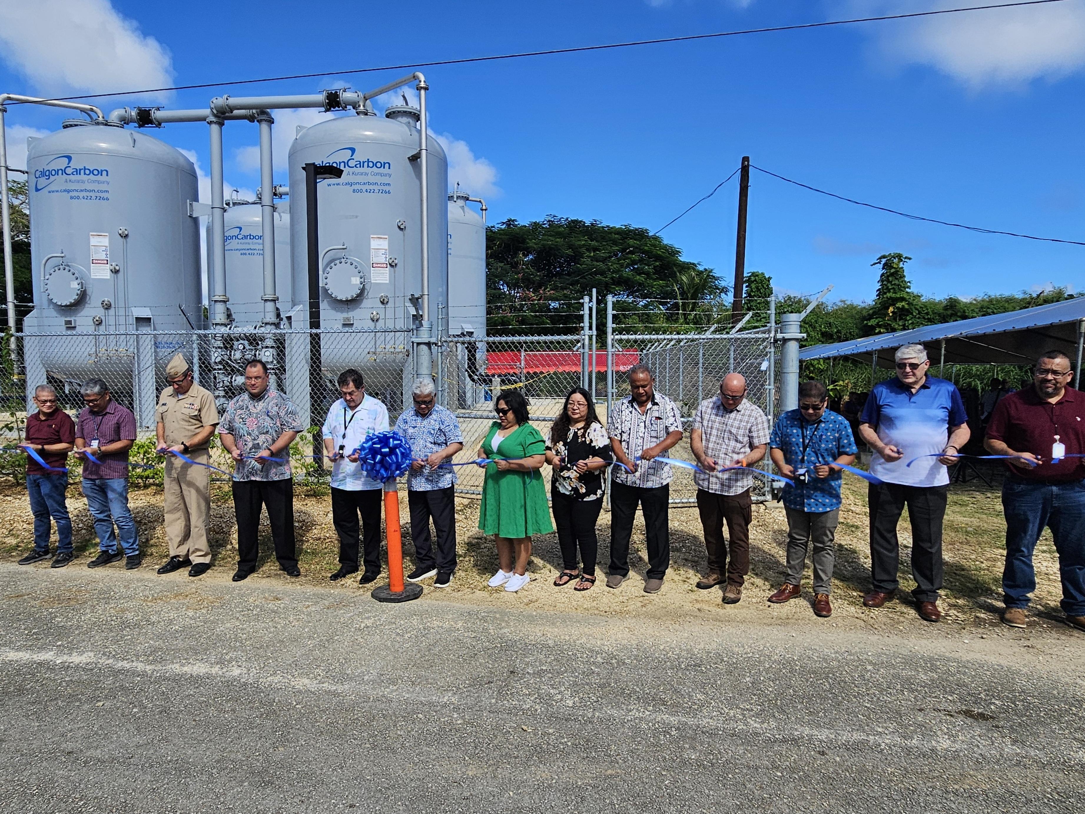 The Commonwealth Utilities Corp. holds a ribbon-cutting ceremony for the completion of the Isley Field and Obyan Wells Granular Activated Carbon or GAC Water Filtration System on Wednesday.  In photo are Gov. Arnold Palacios, CUC Executive Director Kevin Watson, CUC Board Chair Janice Tenorio, CUC board member Miranda Manglona, Bureau of Environmental and Coastal Quality Safe Drinking Water Manager Travis Spaeth, CUC Water & Wastewater Engineering Manager Larry Manacop, Speaker Edmund Villagomez, Commonwealth Public Utilities Commission Chair James Sirok, Commonwealth Ports Authority Board Chair Ramon Tebuteb, other CUC officials, staffers and representatives of Coreplus Construction, the project contractor.