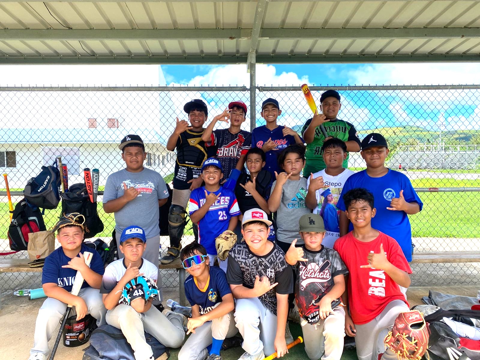 The players of the CNMI U12 Baseball Team pose for a group photo during a break from practice at the Francisco “Tan Ko” Palacios Baseball Field.