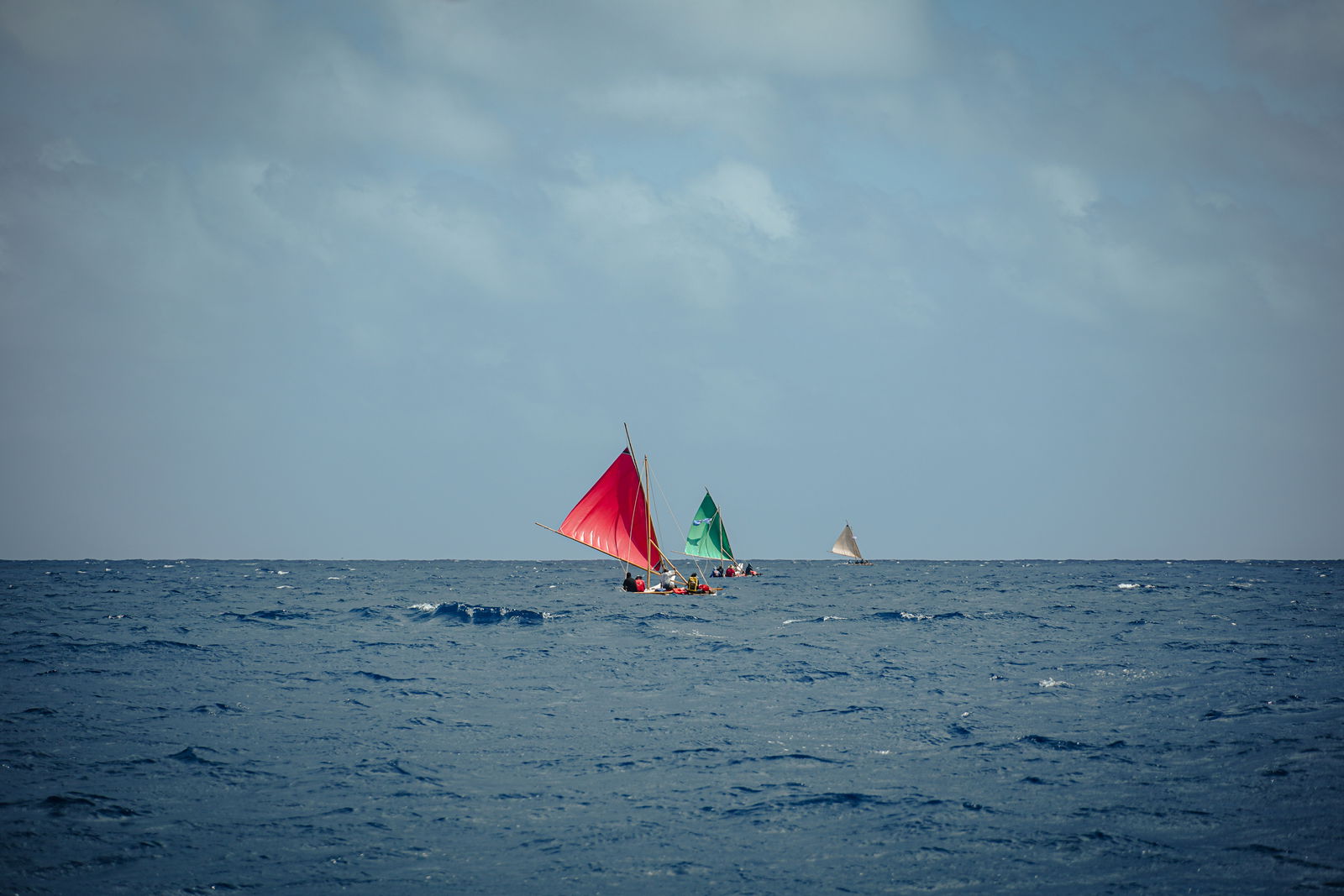 From left to right, Richard Seman, Neni, and Anaguan sail toward Marpi during the Saipan Circumnavigation Sail in 2022.